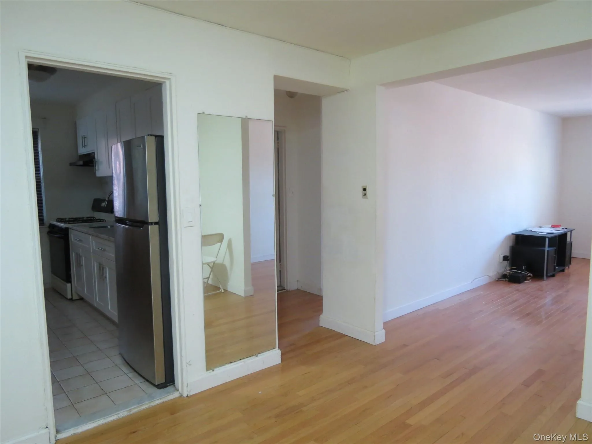 View Of Kitchen Entrance And Hallway To Bedroom And Bathroom View Of Kitchen Entrance And Hallway To Bedroom And Bathroom