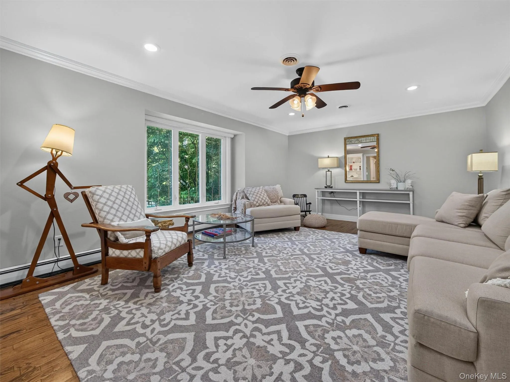 Spacious and inviting, the living room offers an abundance of natural light and plenty of room to gather, relax, and entertain. Spacious and inviting, the living room offers an abundance of natural light and plenty of room to gather, relax, and entertain.