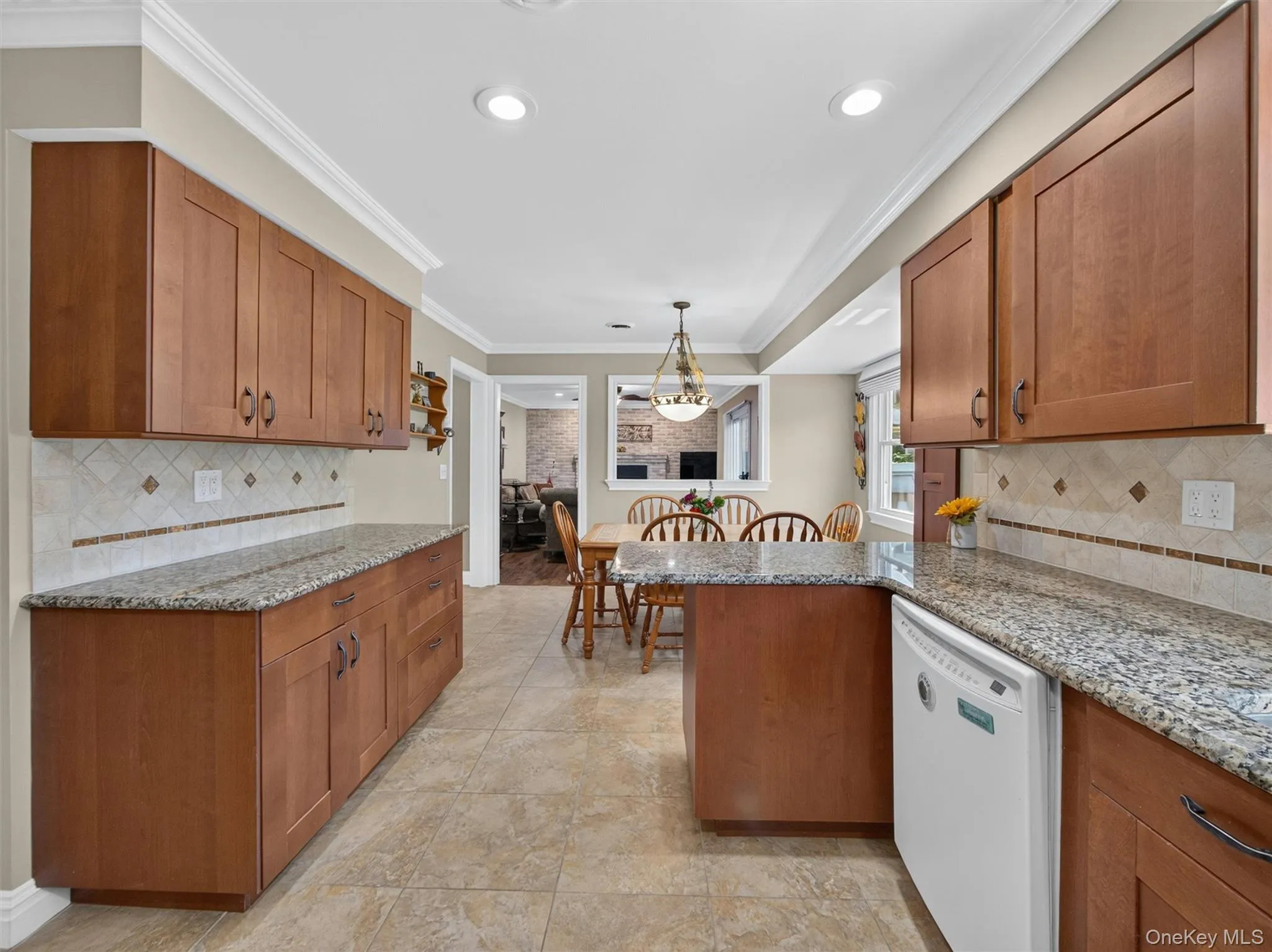 Open sightlines connect the kitchen to adjacent living spaces, creating a natural flow throughout the main level. Open sightlines connect the kitchen to adjacent living spaces, creating a natural flow throughout the main level.
