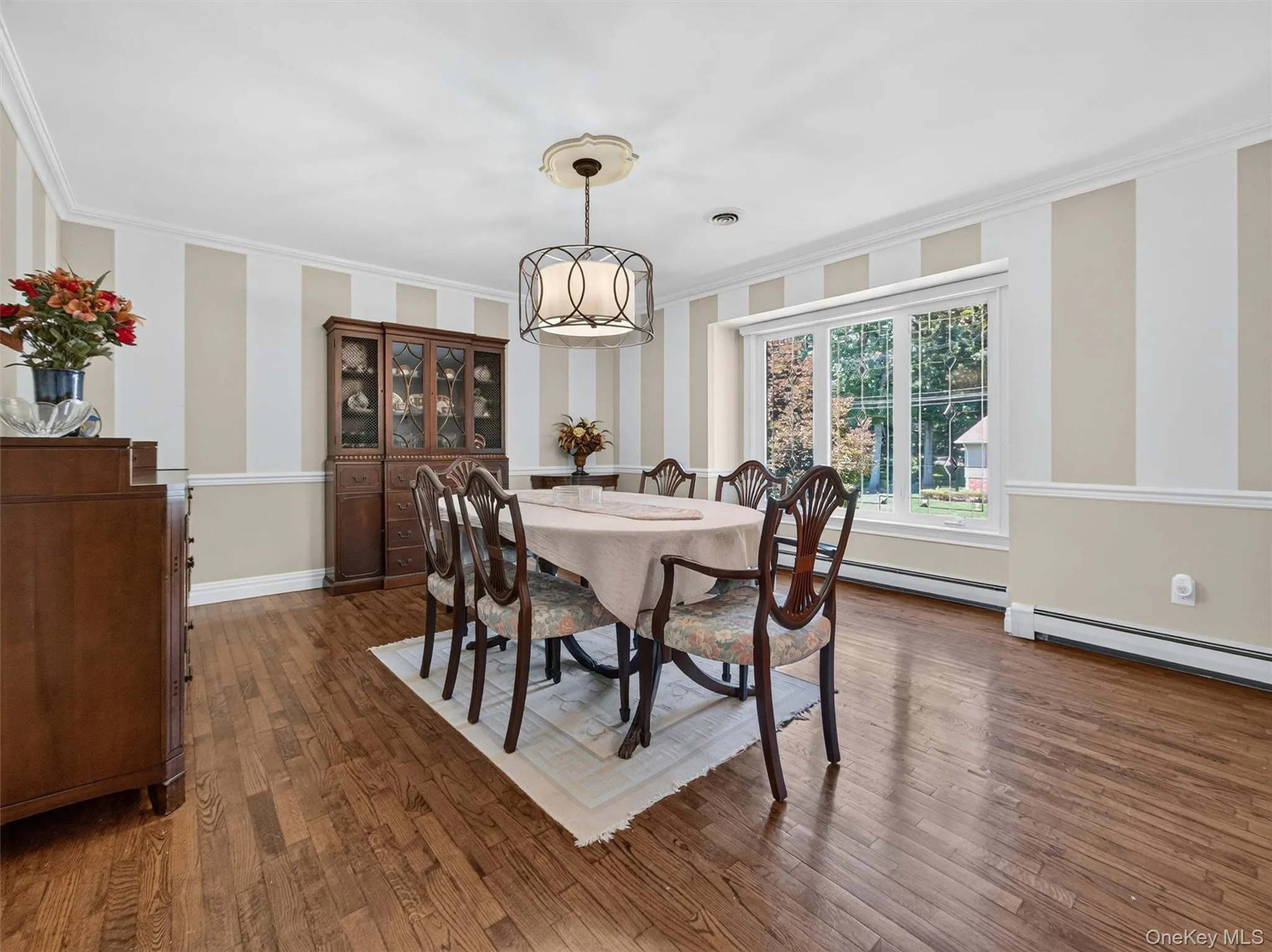 Designed for memorable gatherings, the formal dining room offers generous space, abundant natural light, and timeless architectural character. Designed for memorable gatherings, the formal dining room offers generous space, abundant natural light, and timeless architectural character.