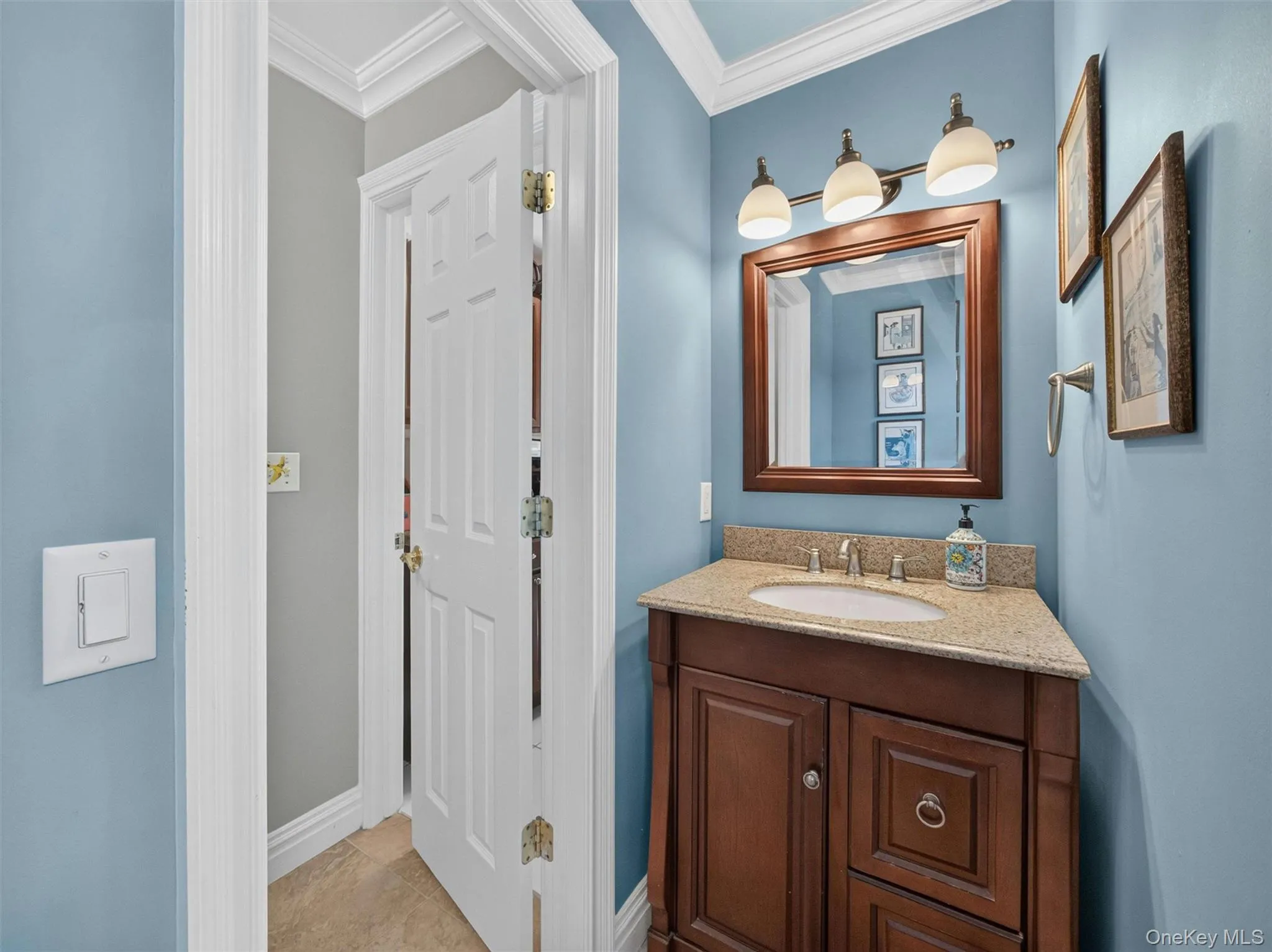 A main-level powder room adds convenience for everyday living and guests. A main-level powder room adds convenience for everyday living and guests.