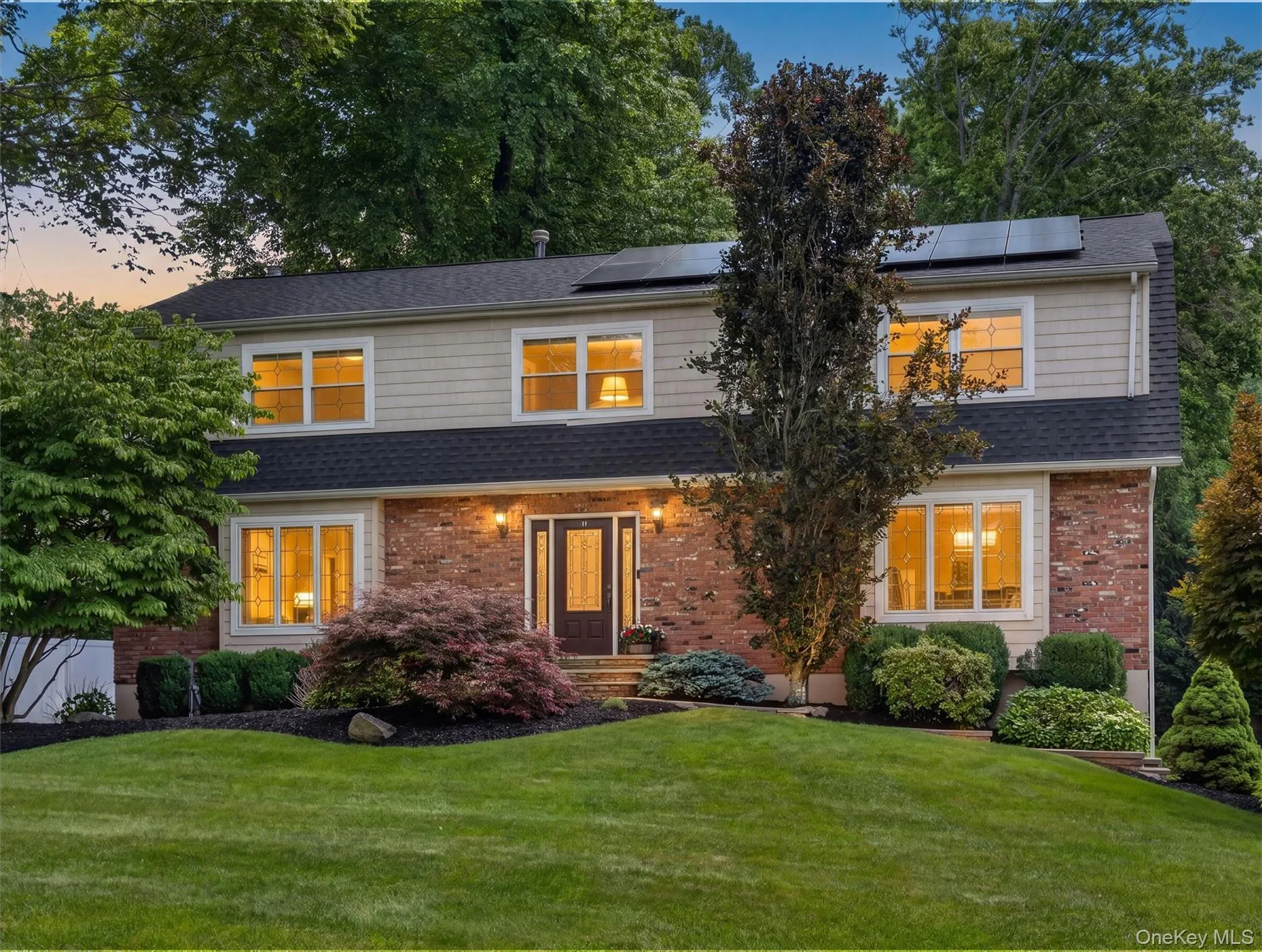 This home's warm glow highlights its timeless elegance and inviting character. This home's warm glow highlights its timeless elegance and inviting character.