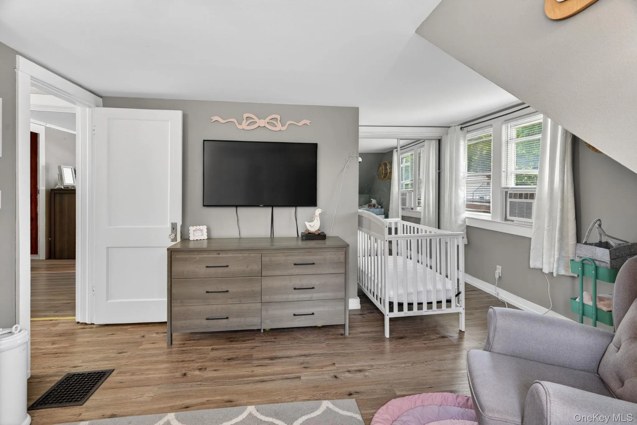 Combining comfort, functionality, and abundant sunlight, this inviting bedroom creates the perfect place to relax and unwind at the end of the day. Combining comfort, functionality, and abundant sunlight, this inviting bedroom creates the perfect place to relax and unwind at the end of the day.