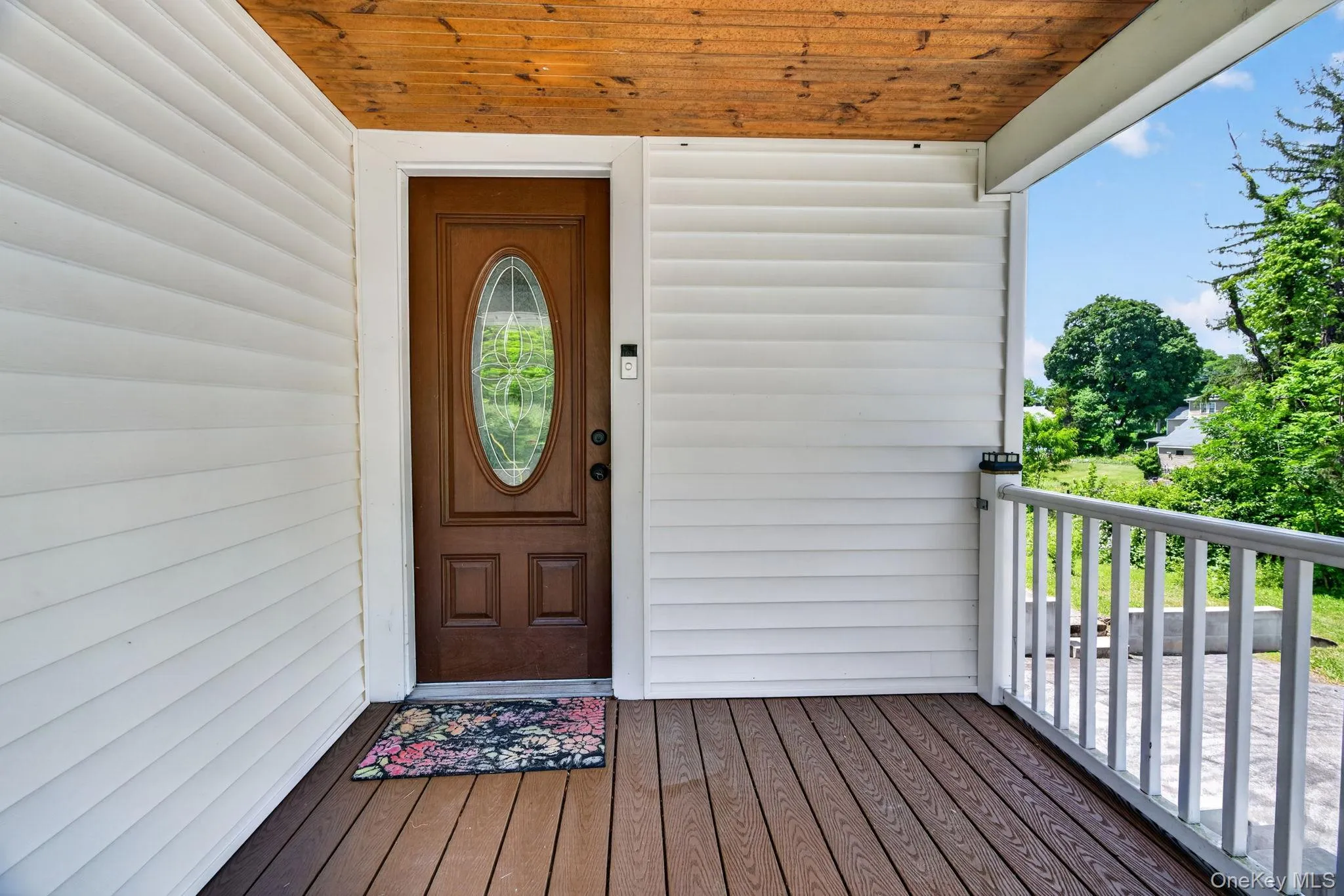 The charming front porch perfectly complements the timeless appeal of this Cape Cod home, creating a warm and welcoming first impression. The charming front porch perfectly complements the timeless appeal of this Cape Cod home, creating a warm and welcoming first impression.