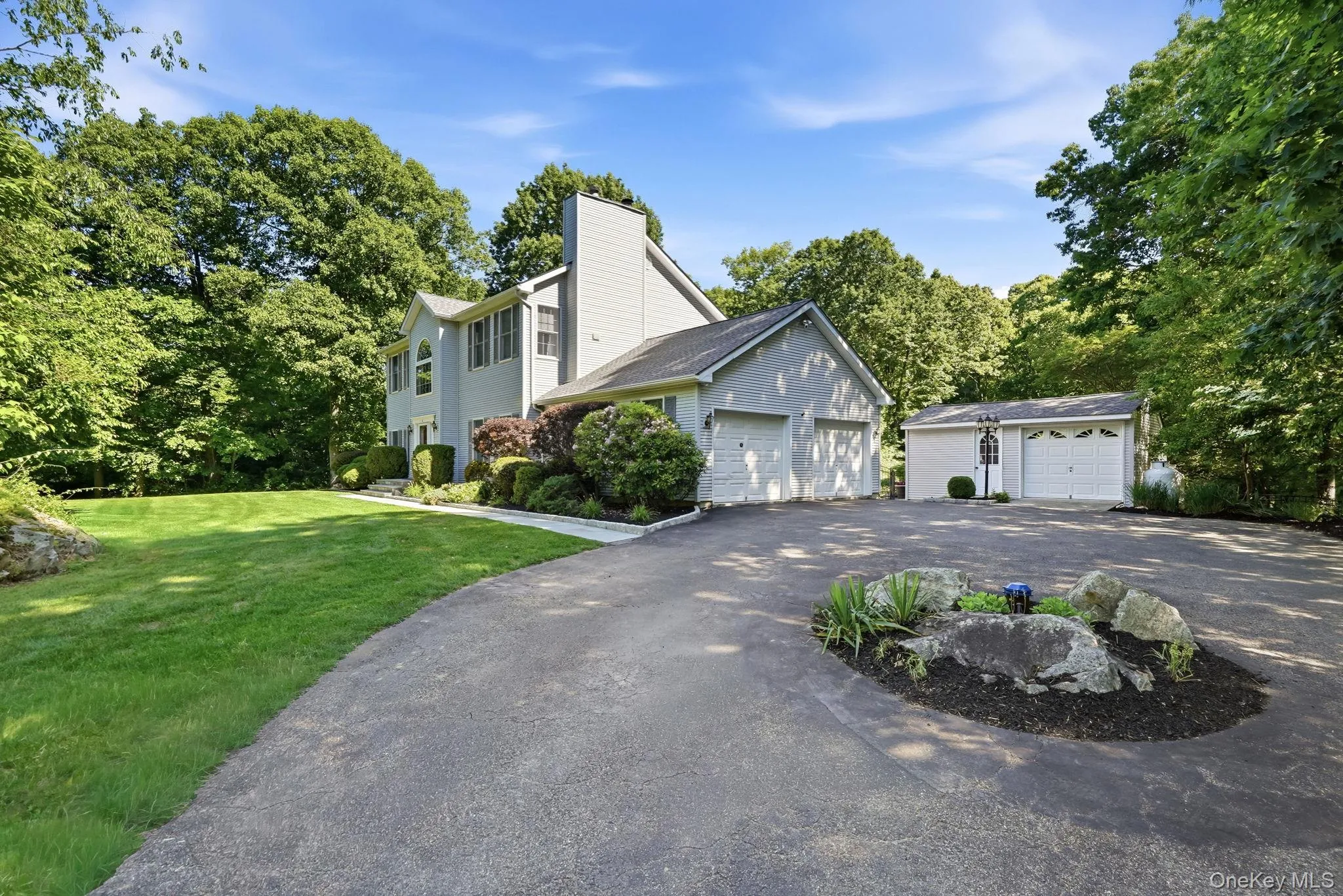 The circular driveway welcomes guests with ease and sets the stage for effortless entertaining. The circular driveway welcomes guests with ease and sets the stage for effortless entertaining.
