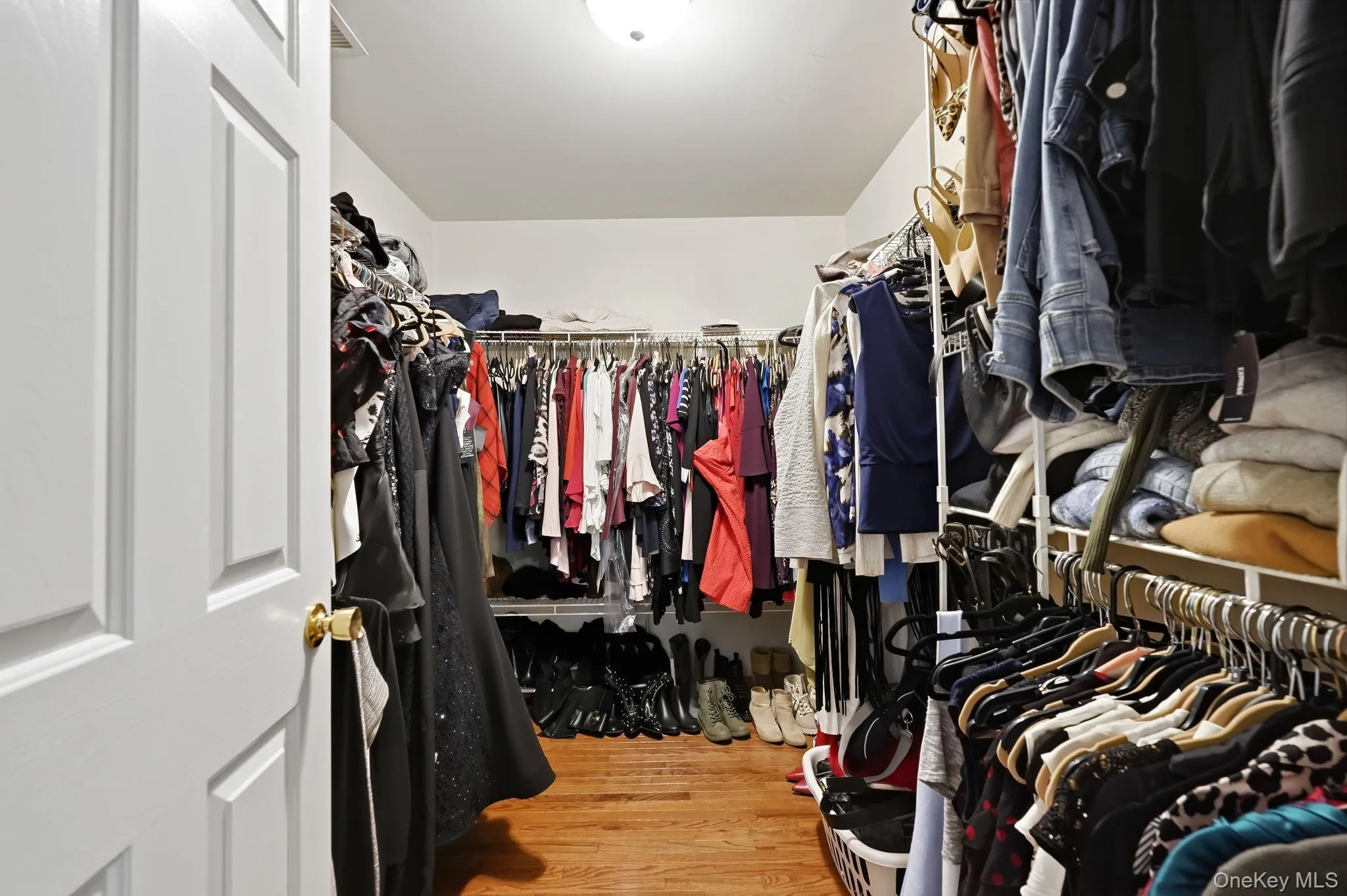Massive primary walk-in closet. Massive primary walk-in closet.