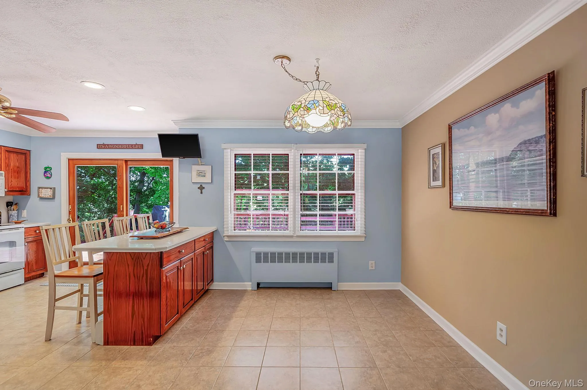 dining room overlooking the open layout kitchen with breakfast bar dining room overlooking the open layout kitchen with breakfast bar