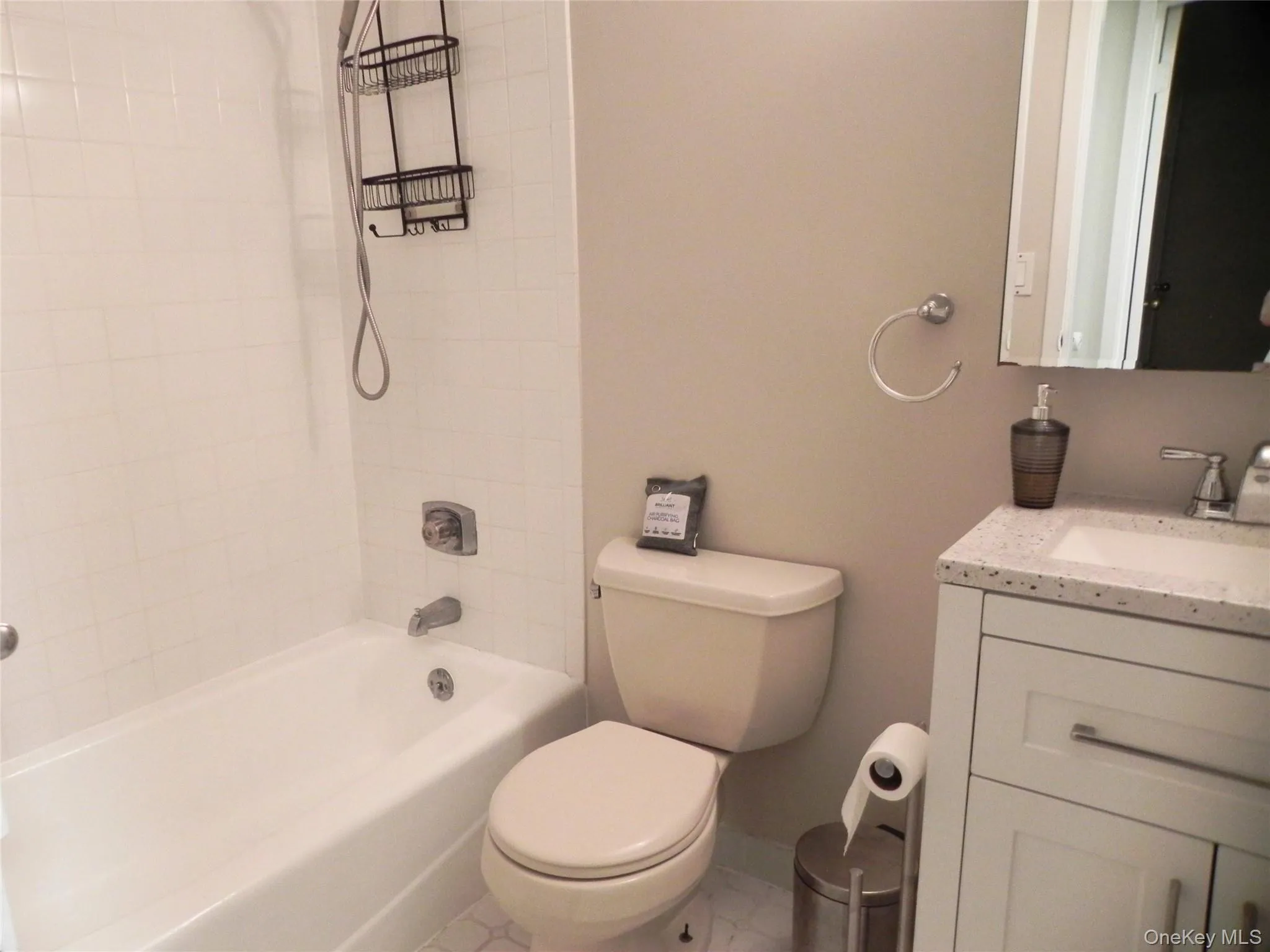 Full bath with vanity and shower / washtub combination Full bath with vanity and shower / washtub combination