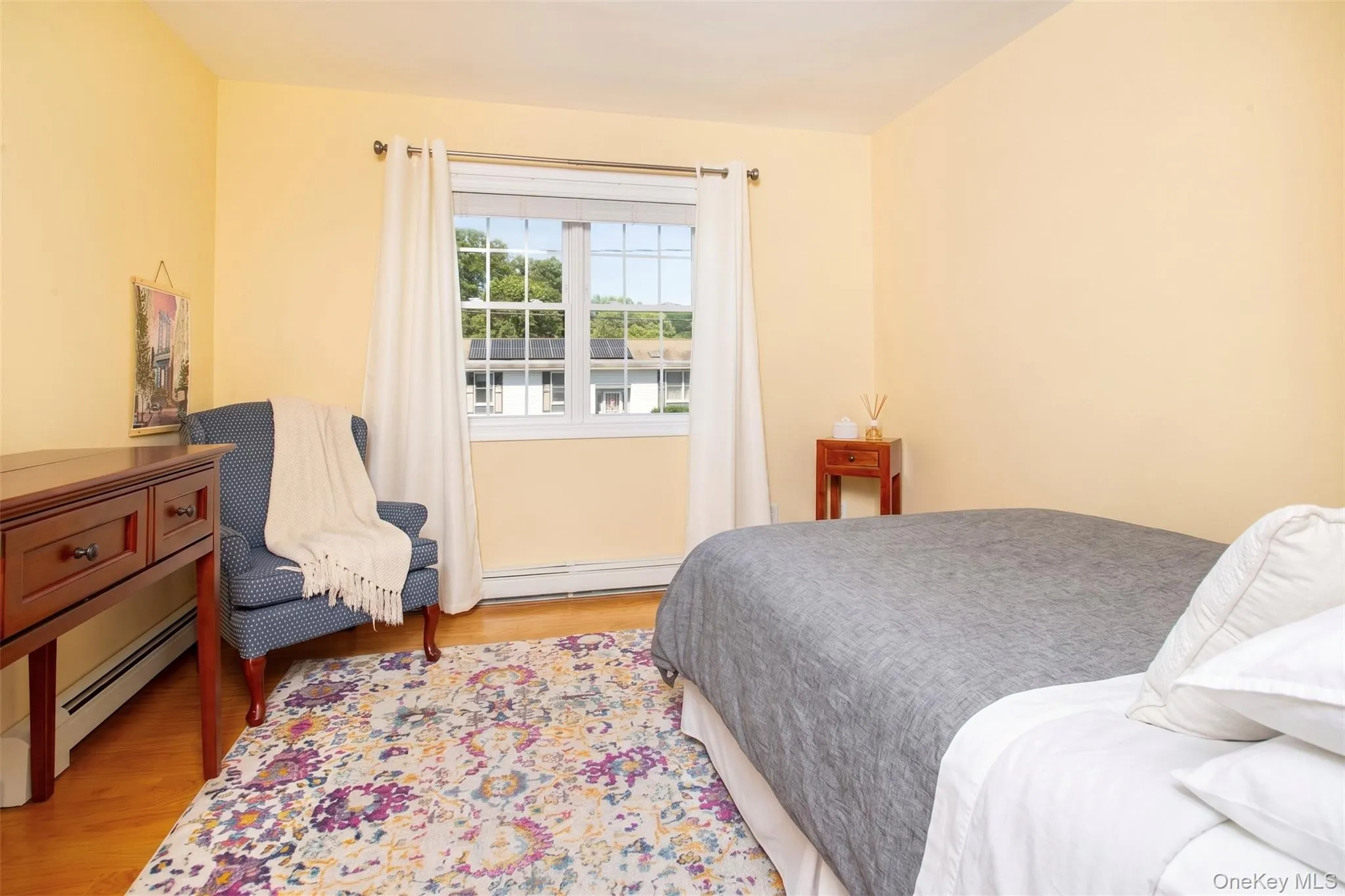 Spacious second floor bedroom with full closet, one of four bedrooms on this level. Bedding virtually updated. Spacious second floor bedroom with full closet, one of four bedrooms on this level. Bedding virtually updated.