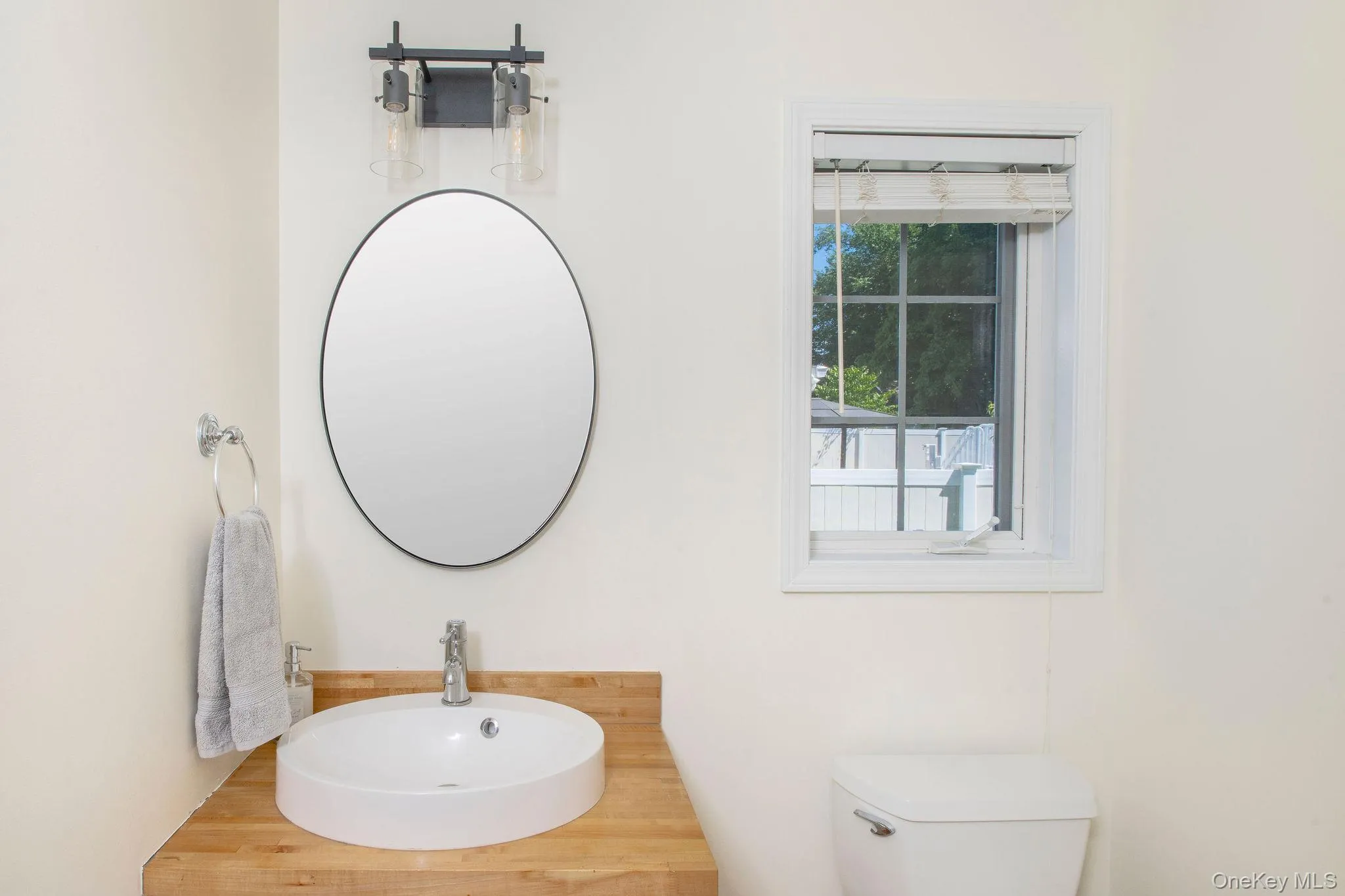 Recently updated first floor half bath. Recently updated first floor half bath.
