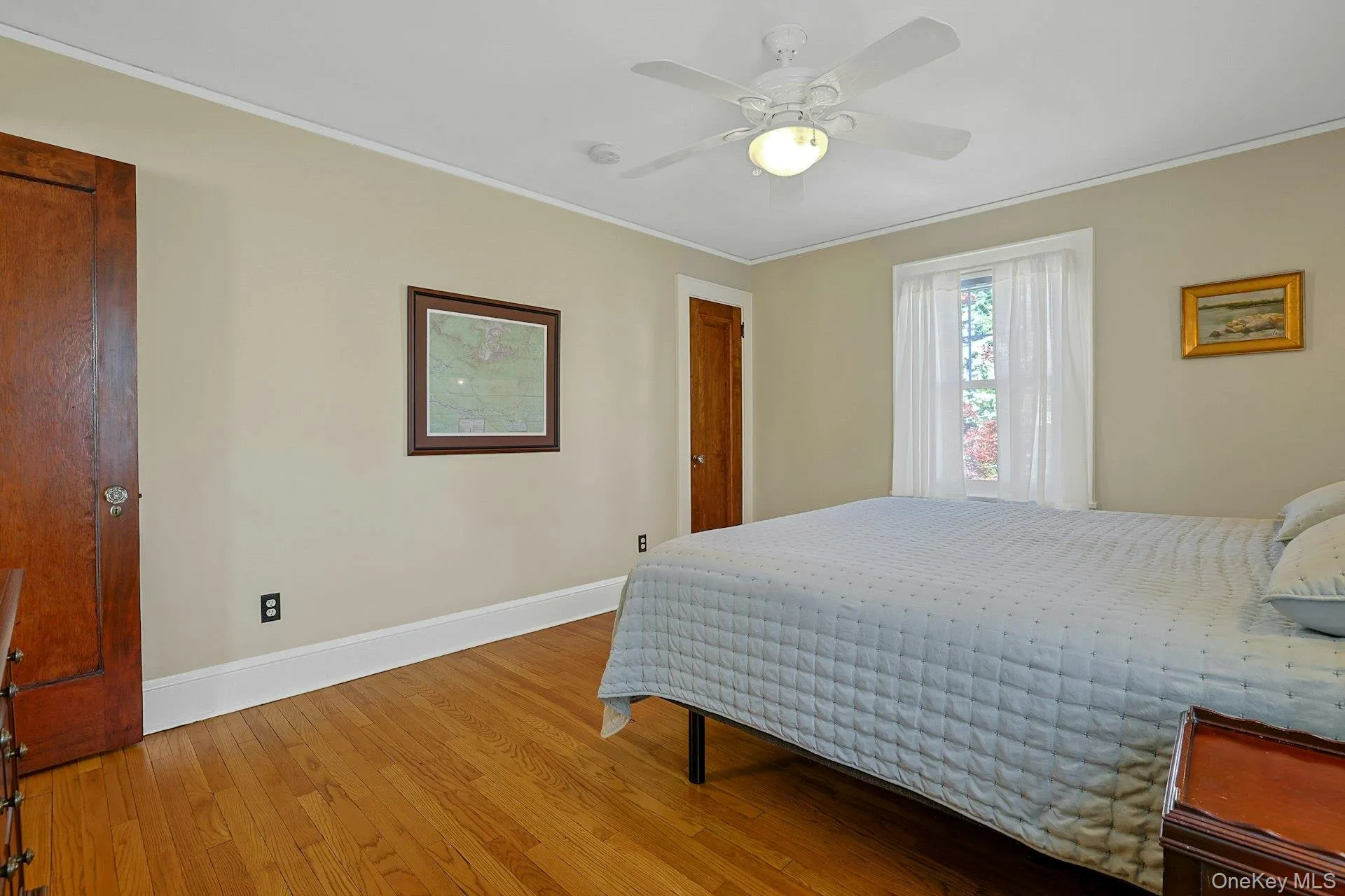 Alt view of bedroom 1 with original doors/glass door knobs Alt view of bedroom 1 with original doors/glass door knobs