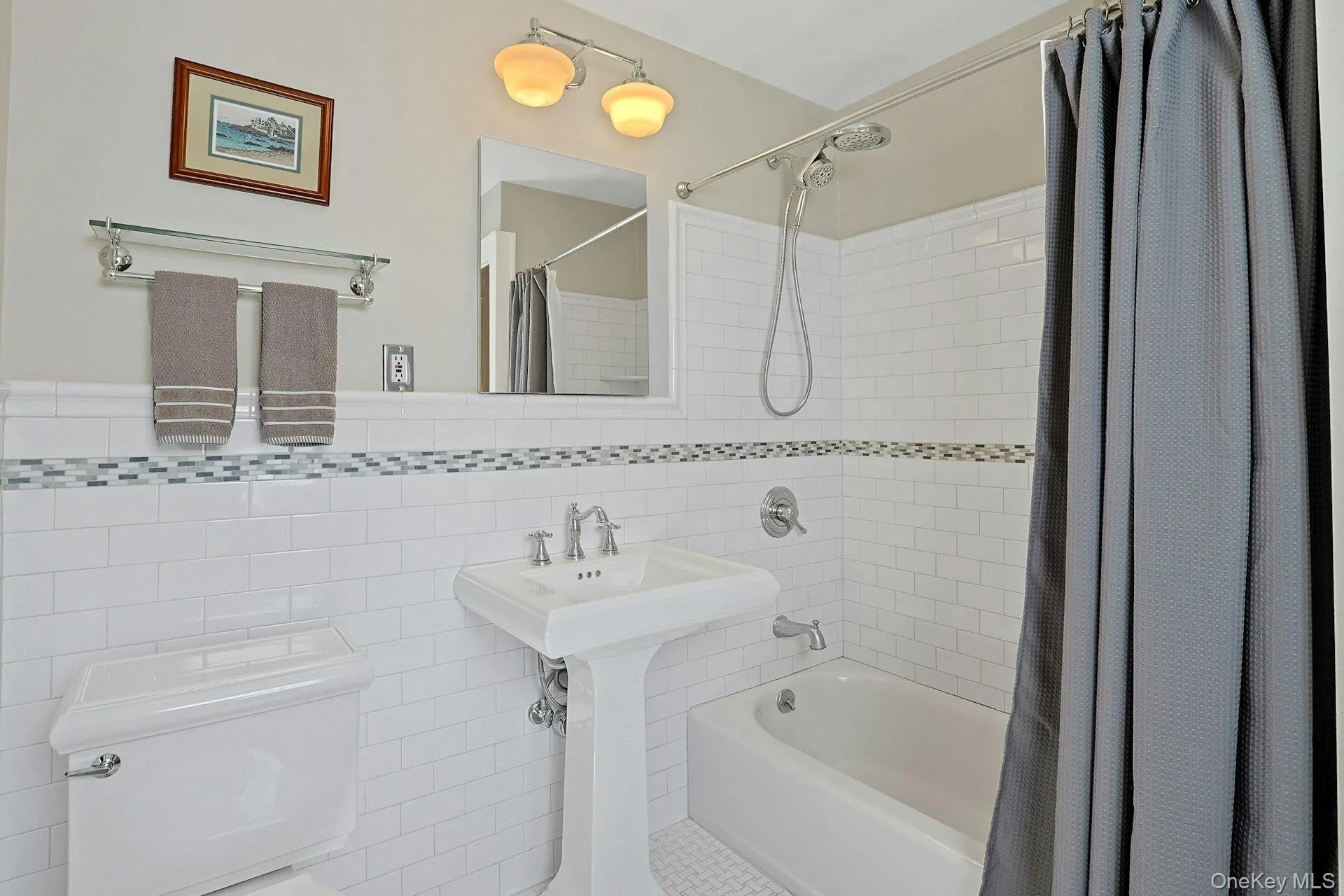 Beautifully updated and spacious full bathroom with large linen closet Beautifully updated and spacious full bathroom with large linen closet