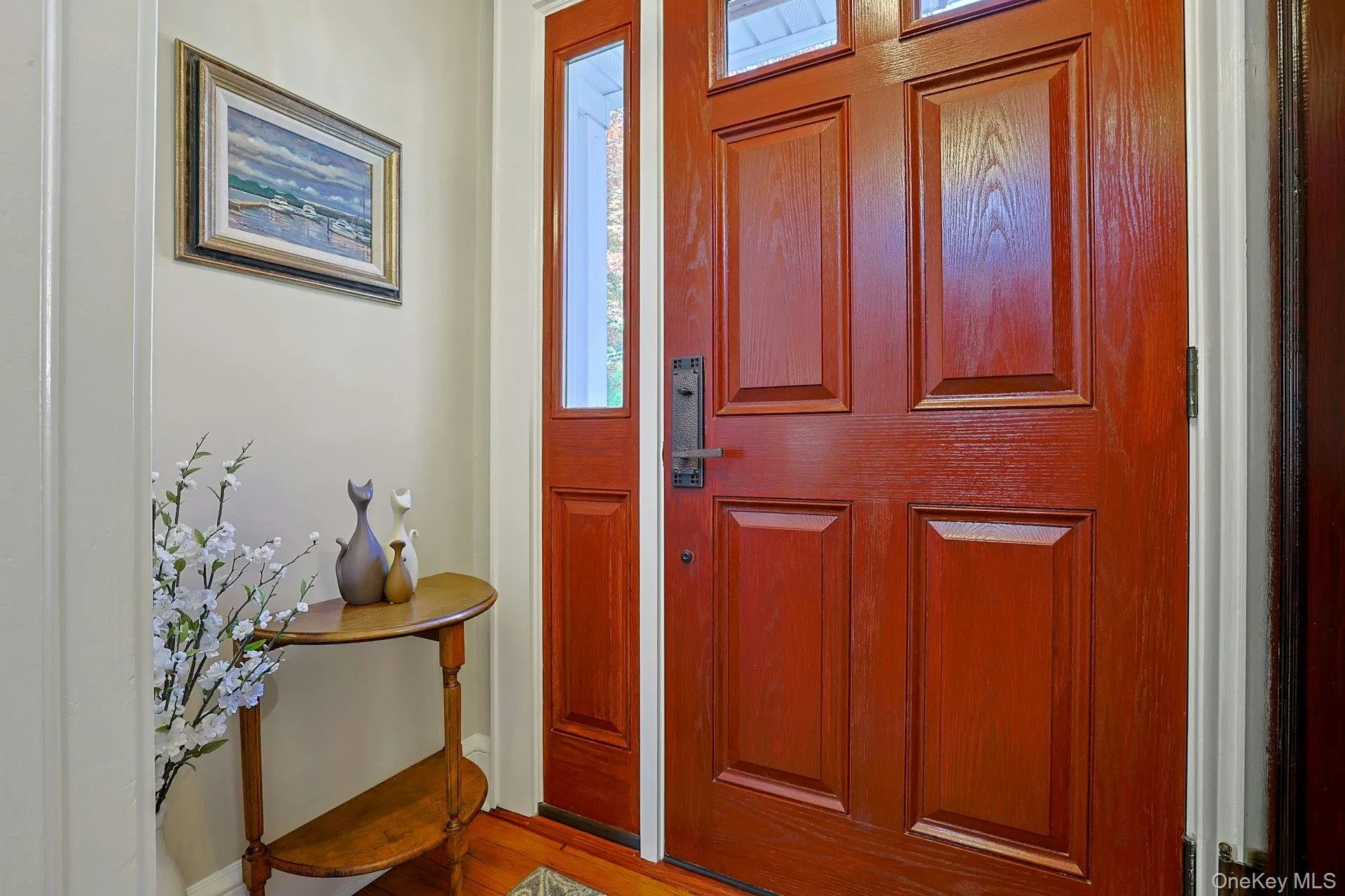 Vestibule with beautiful front door and French door into the living space. Vestibule with beautiful front door and French door into the living space.