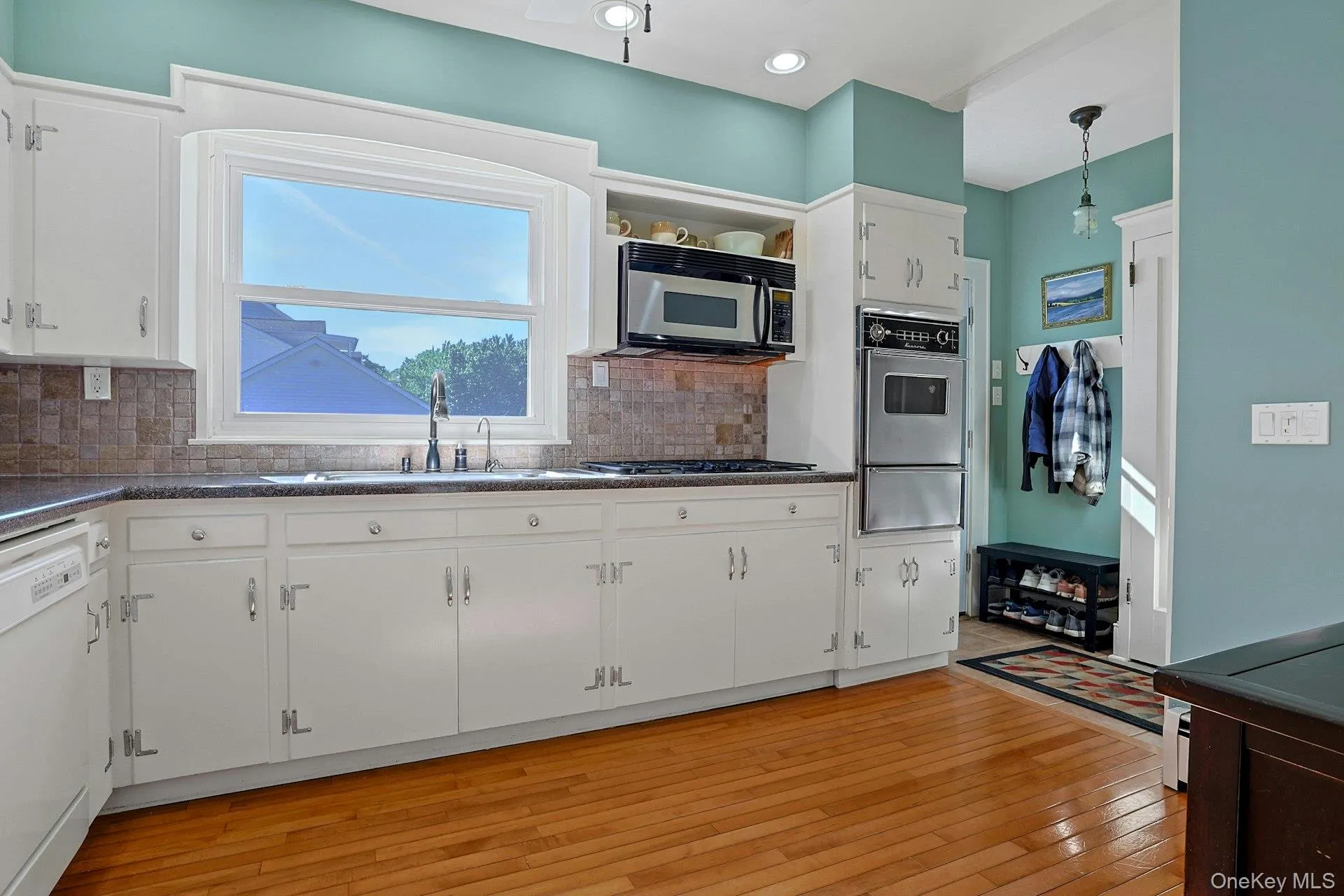 Small mudroom with doors to deck and to basement Small mudroom with doors to deck and to basement