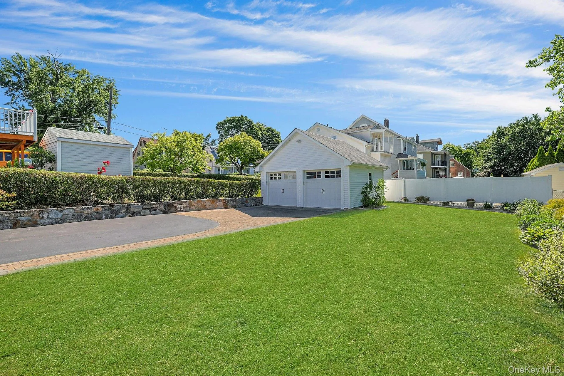 Level yard with beautiful plantings Level yard with beautiful plantings