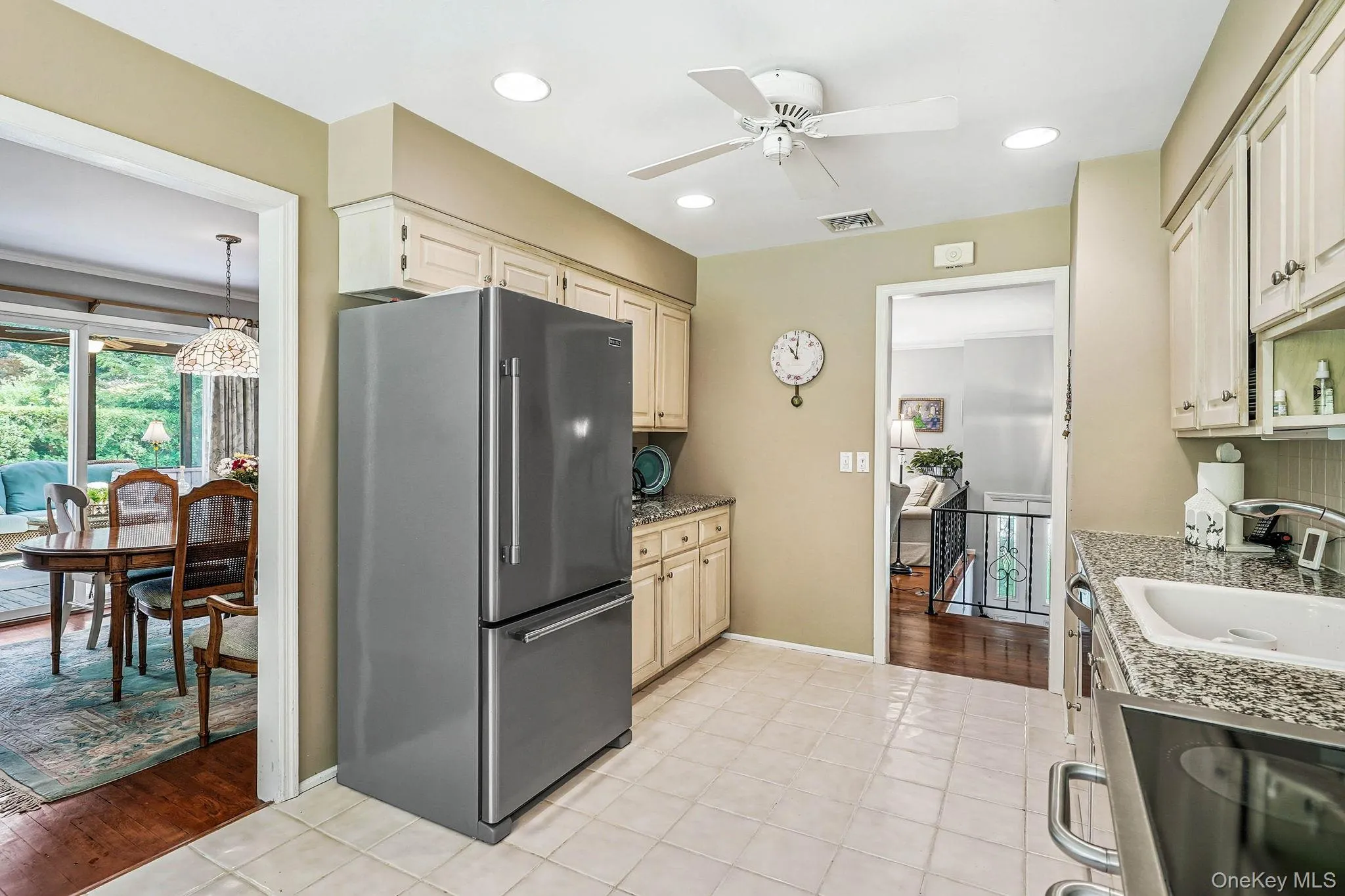 Kitchen showing stainless appliances and access to dining room and living room Kitchen showing stainless appliances and access to dining room and living room