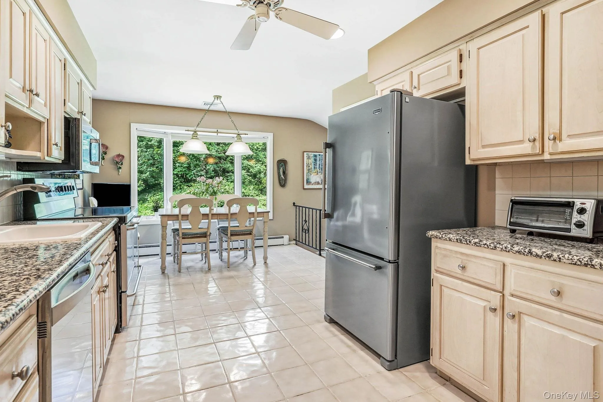 Country kitchen with bay window and back staircase Country kitchen with bay window and back staircase