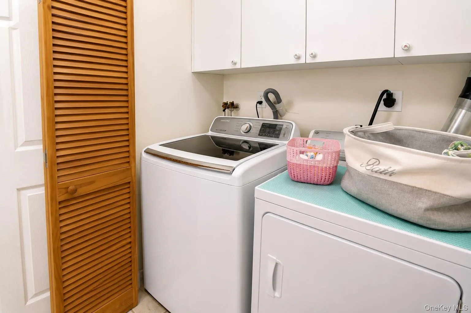 Laundry within full bath Laundry within full bath