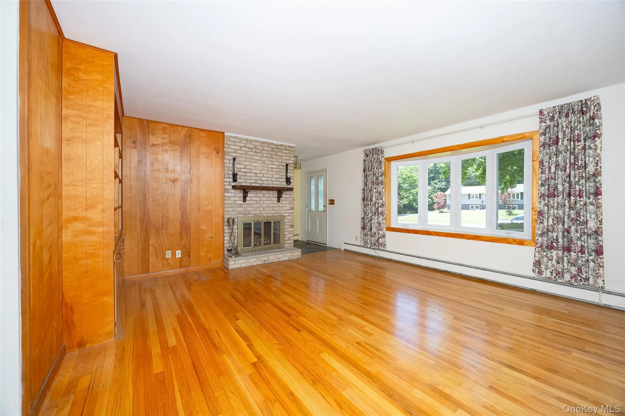 Beautiful hardwood floors, custom built-ins, and a cozy fireplace Beautiful hardwood floors, custom built-ins, and a cozy fireplace