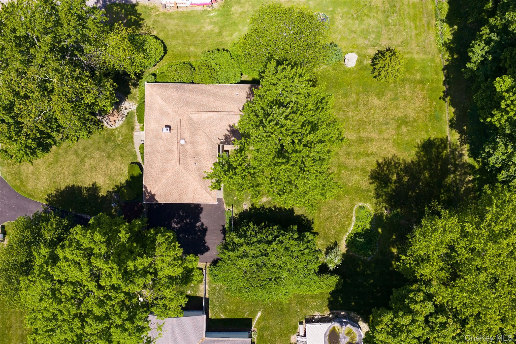Beautifully landscaped half-acre lot Beautifully landscaped half-acre lot