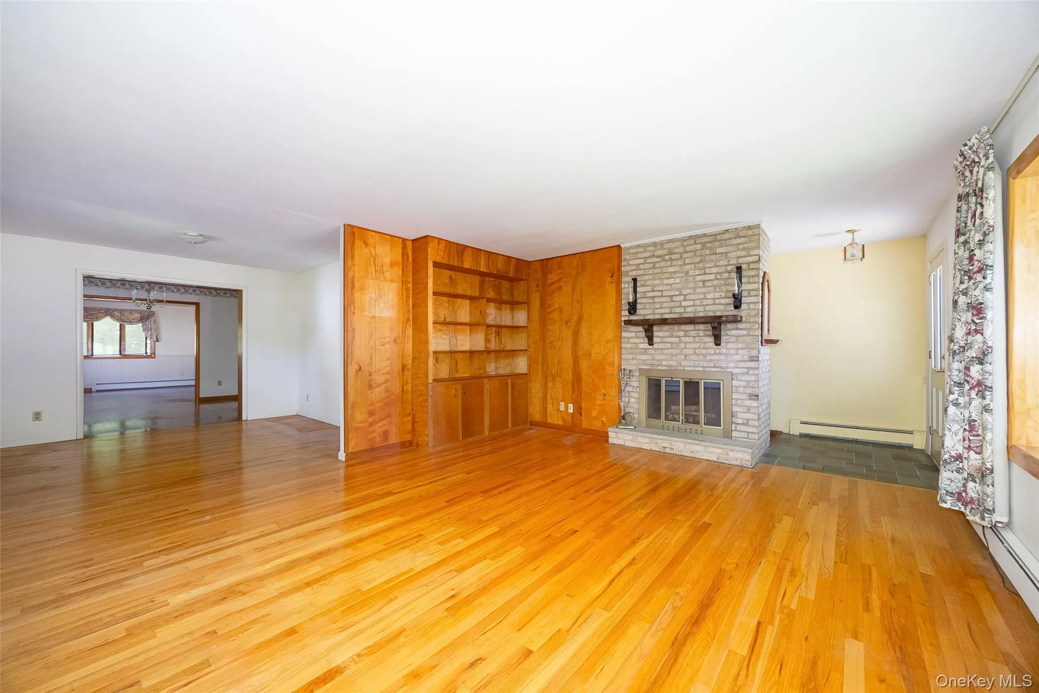 Beautiful hardwood floors, custom built-ins, and a cozy fireplace Beautiful hardwood floors, custom built-ins, and a cozy fireplace