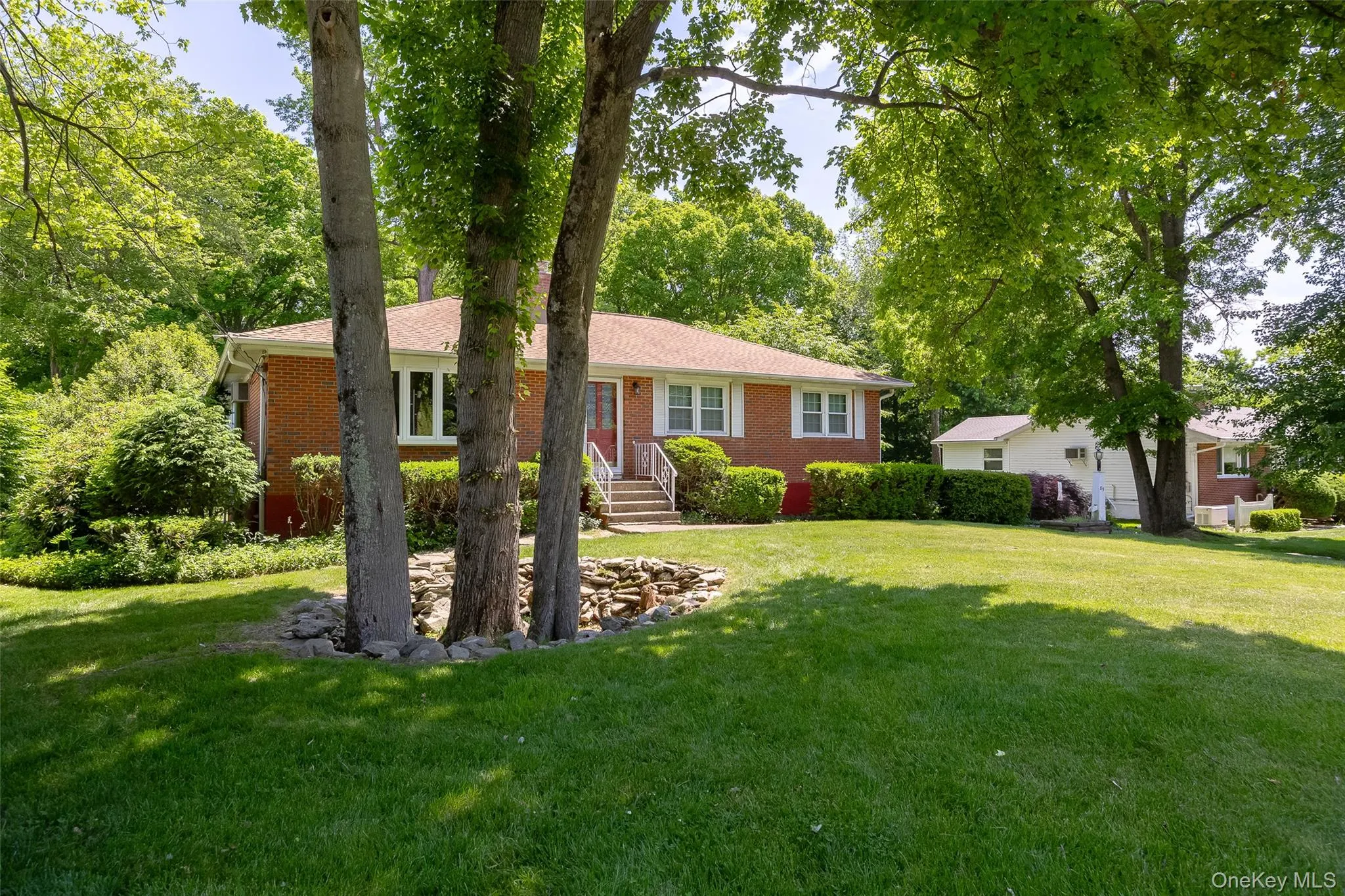 Beautifully landscaped half-acre lot Beautifully landscaped half-acre lot