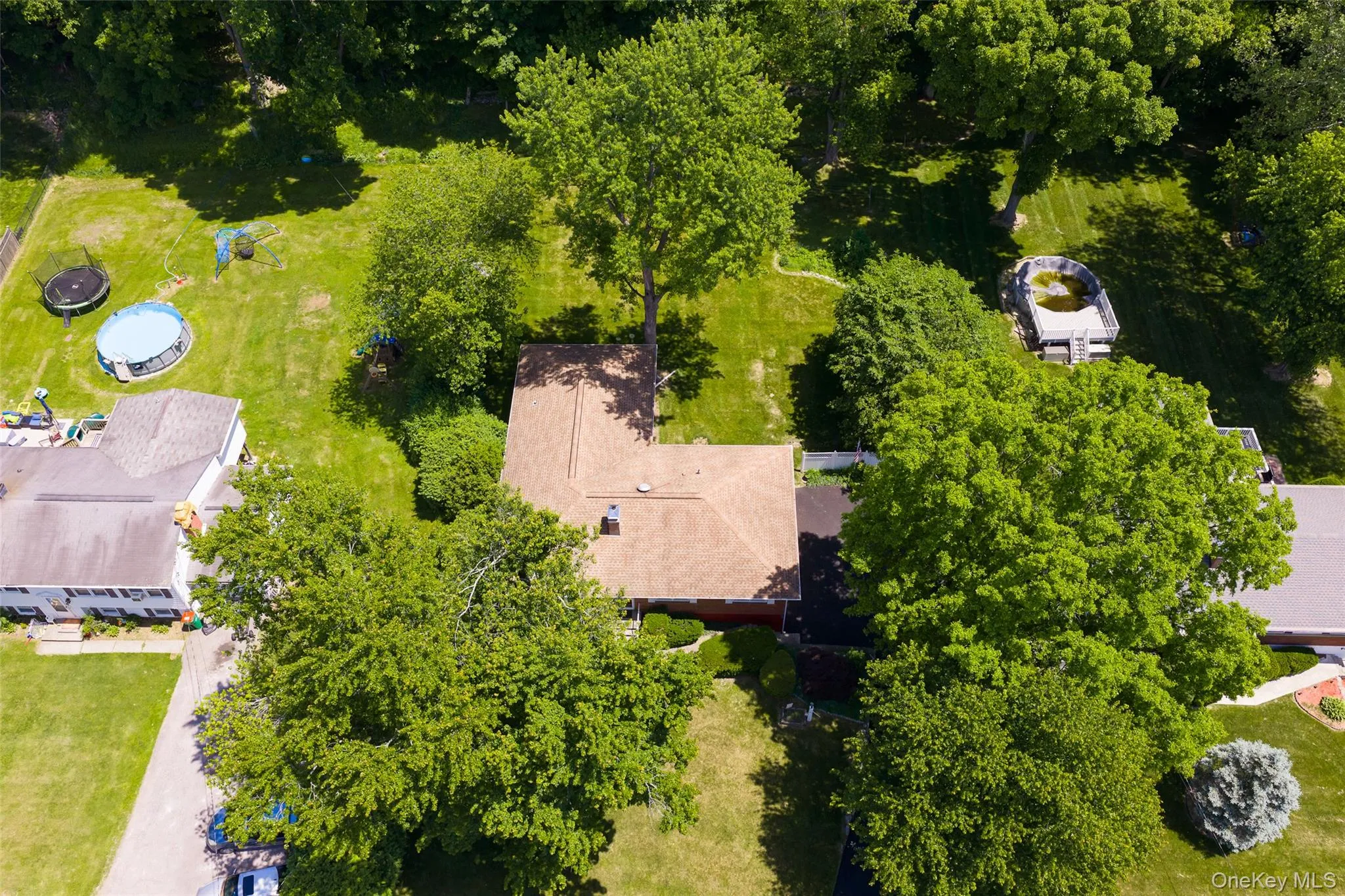 Beautifully landscaped half-acre lot Beautifully landscaped half-acre lot