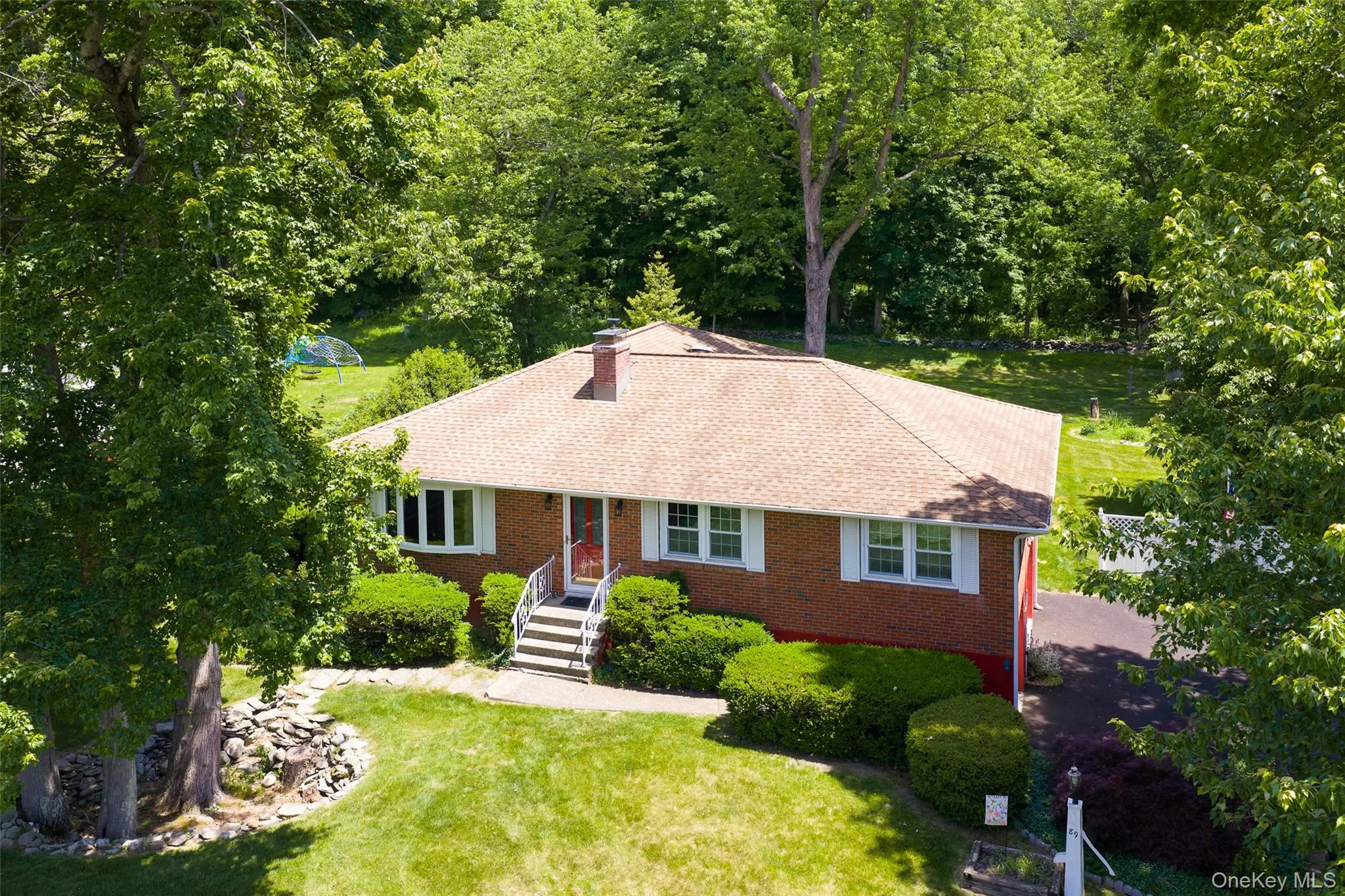 Beautifully landscaped half-acre lot Beautifully landscaped half-acre lot