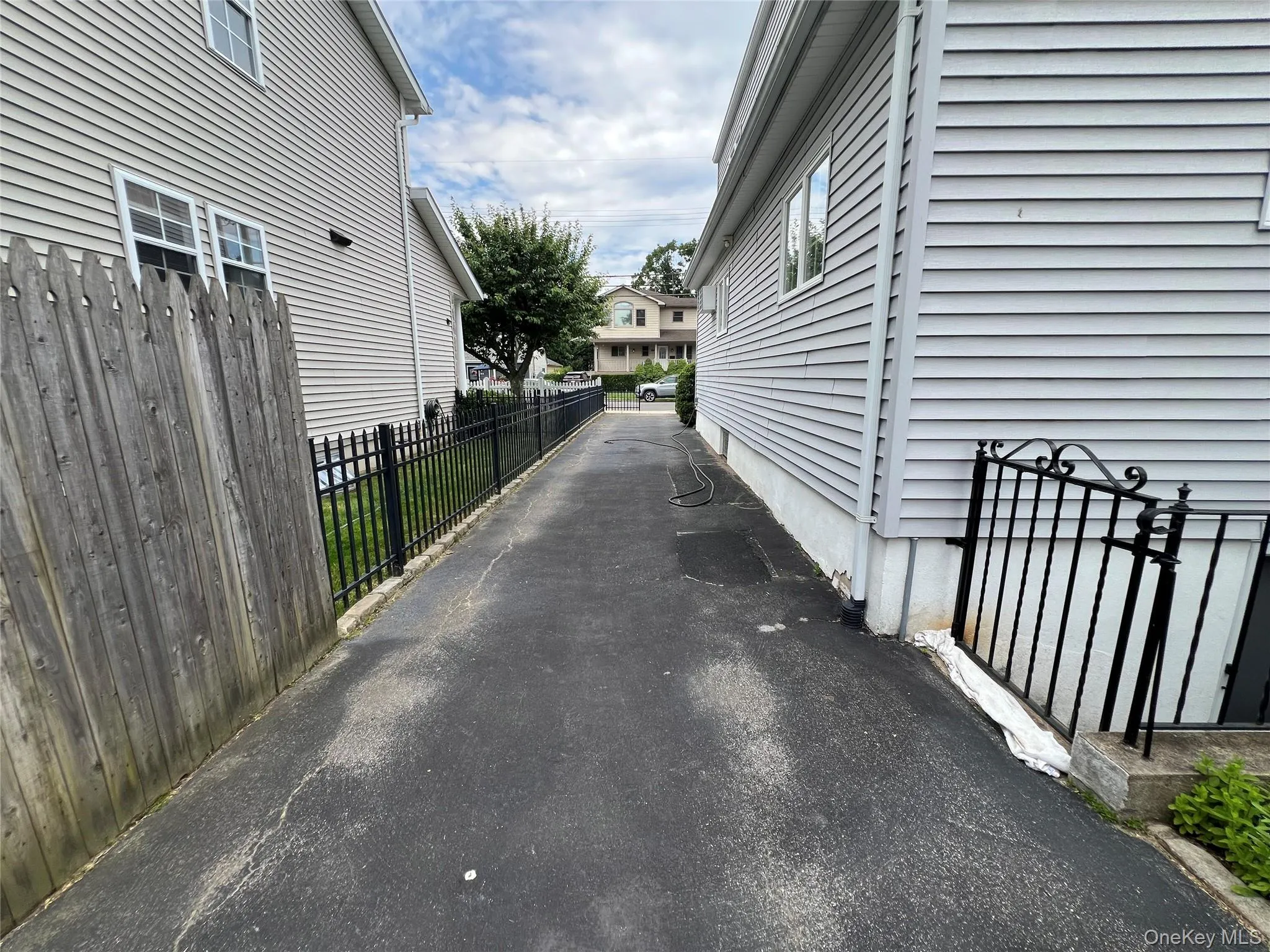 long driveway with enclosed gate long driveway with enclosed gate