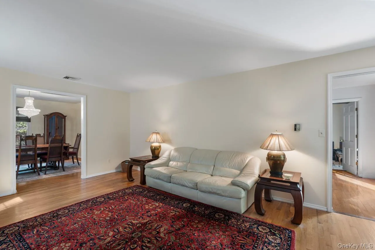 The Living Room is open to the formal dining room The Living Room is open to the formal dining room