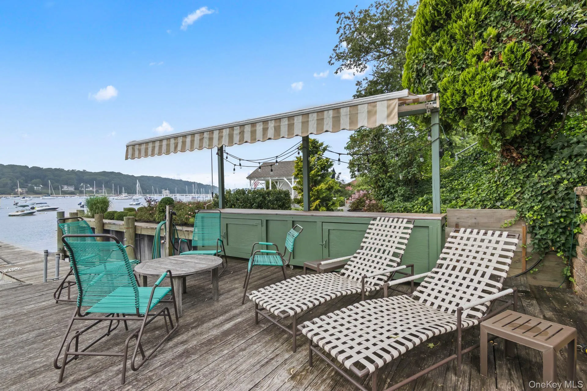 Water-level outdoor living space overlooking the harbor Water-level outdoor living space overlooking the harbor