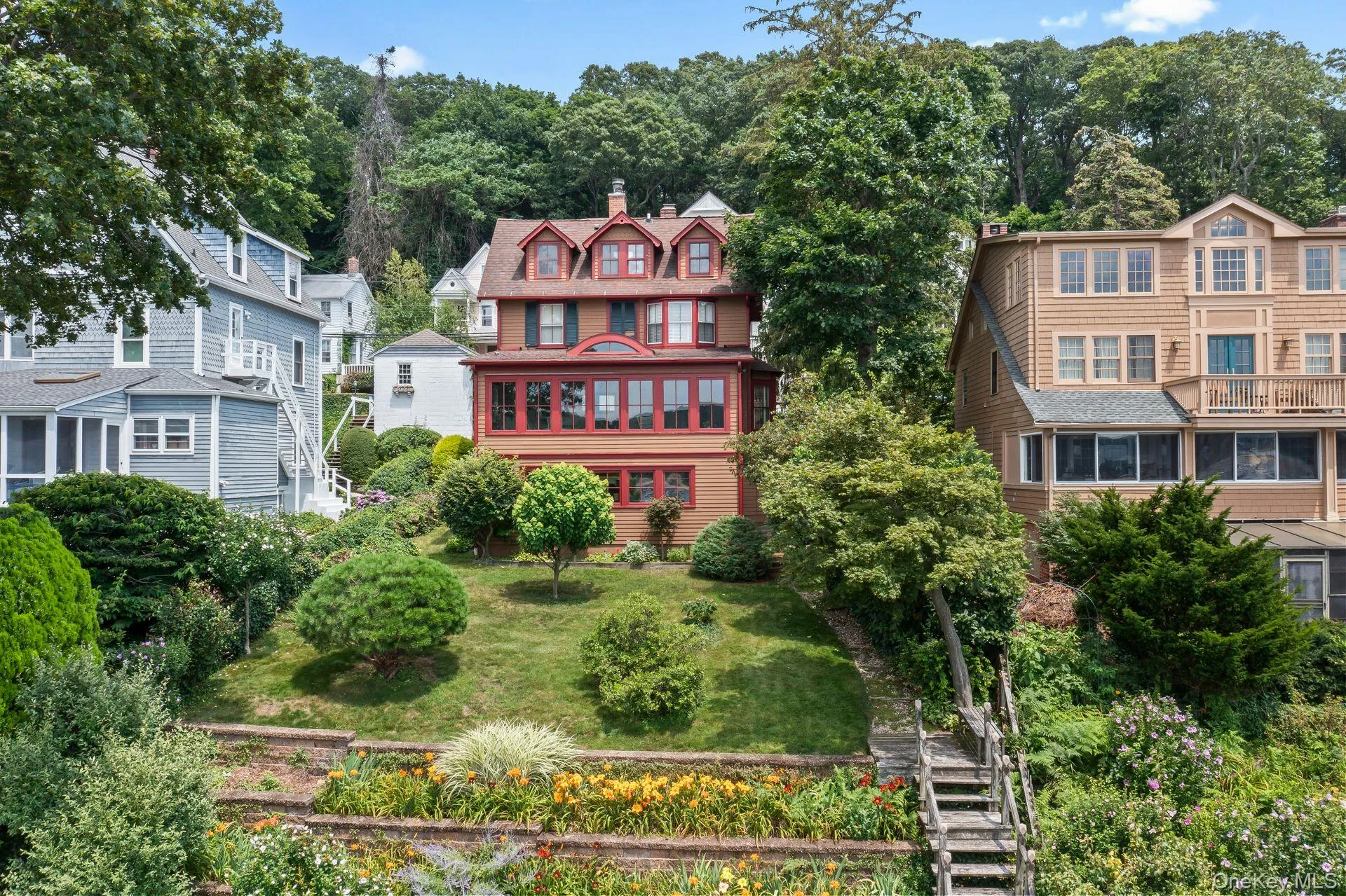 Historic waterfront setting with terraced landscaping and dock Historic waterfront setting with terraced landscaping and dock