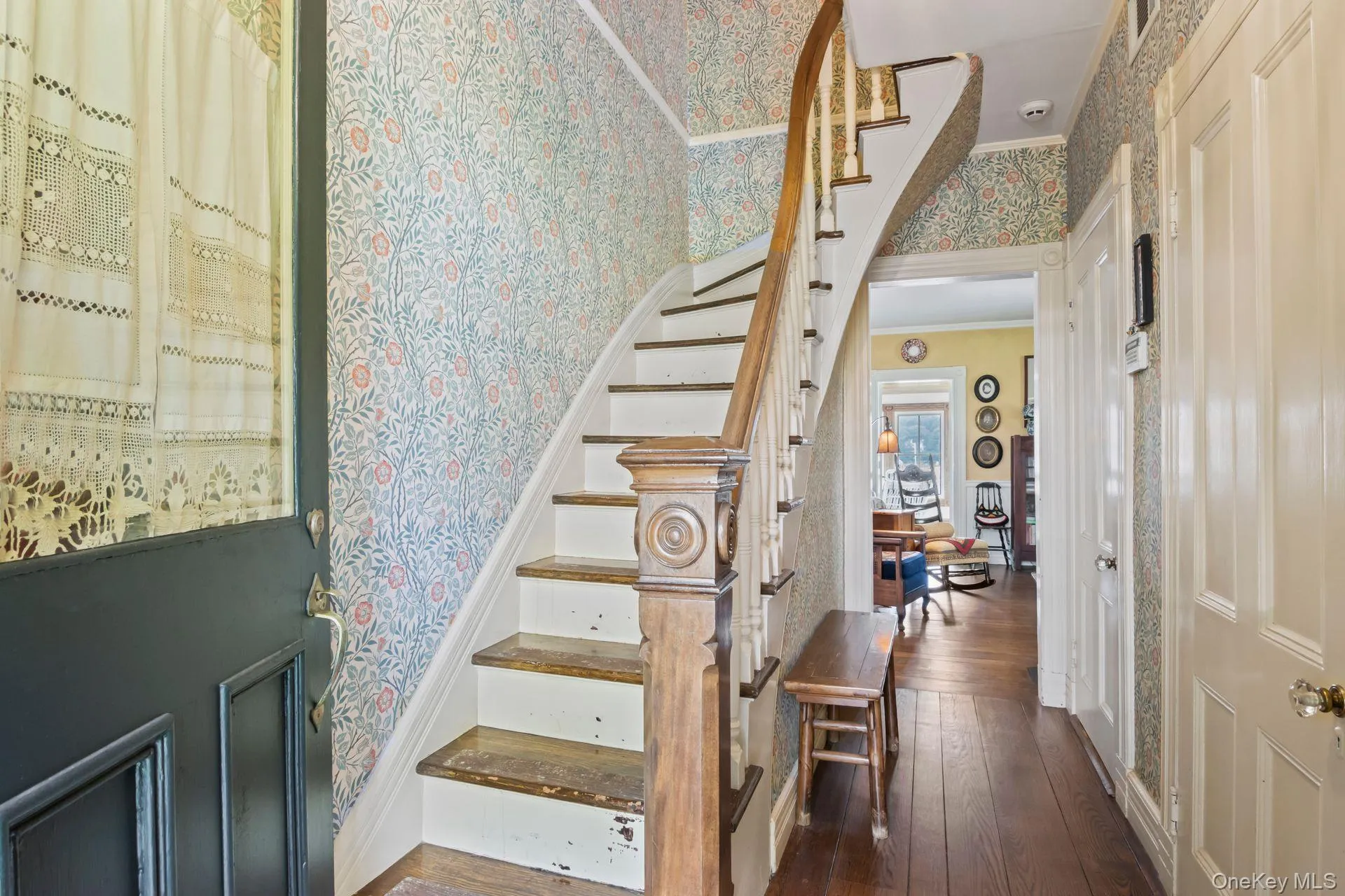 Original staircase showcasing historic character and charm Original staircase showcasing historic character and charm