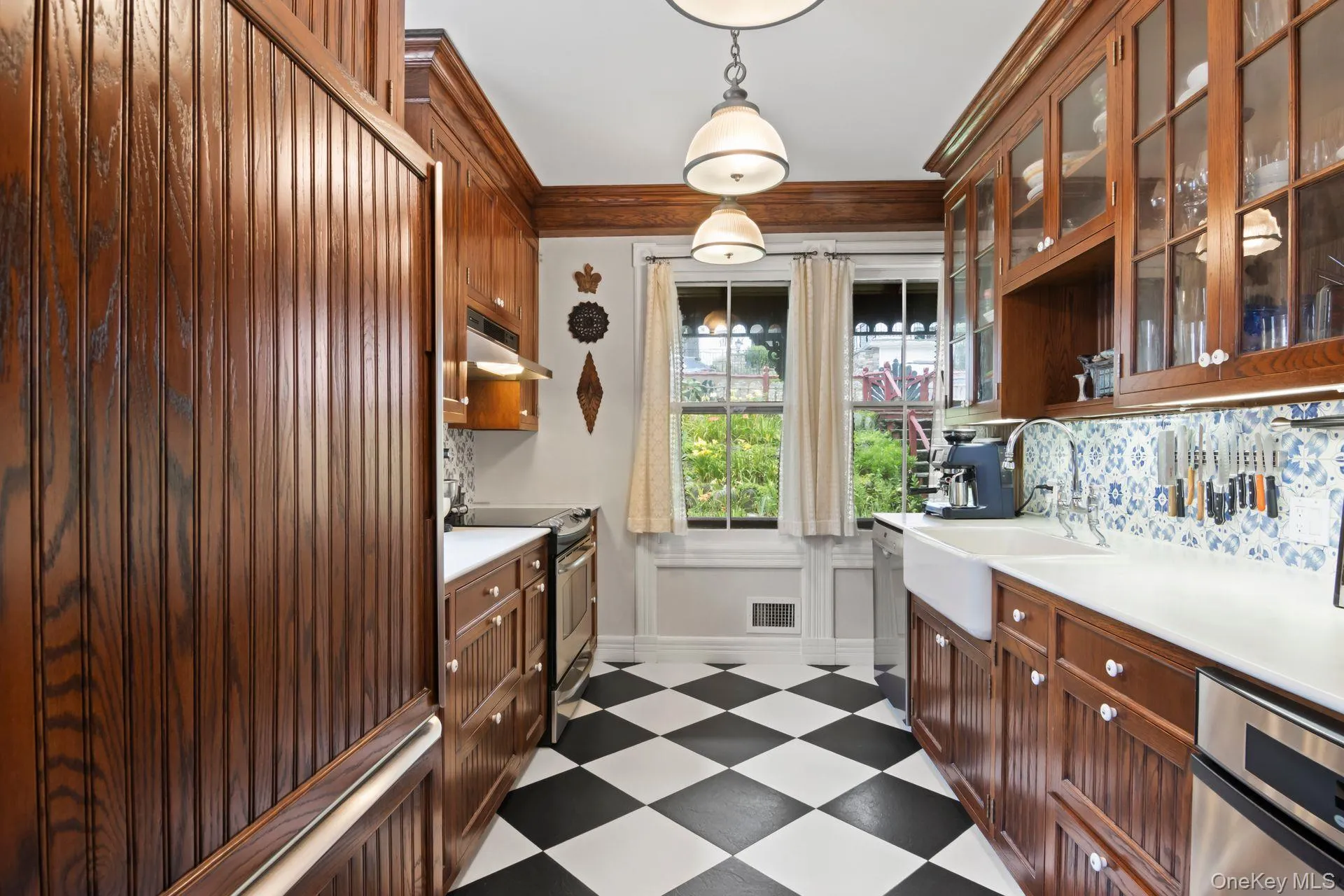 Classic galley kitchen with custom cabinetry Classic galley kitchen with custom cabinetry