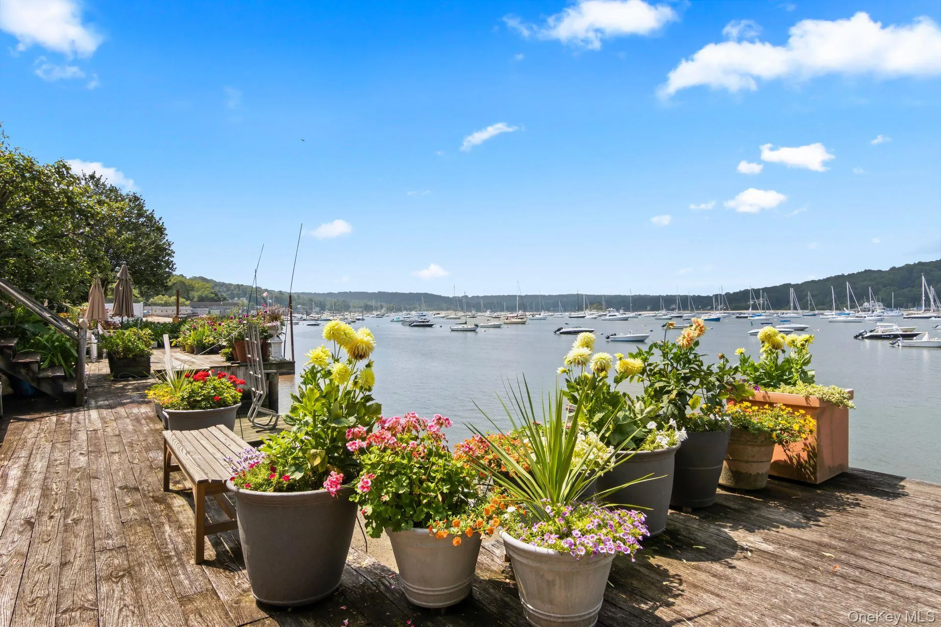 Expansive waterfront dock perfect for entertaining and sunsets Expansive waterfront dock perfect for entertaining and sunsets