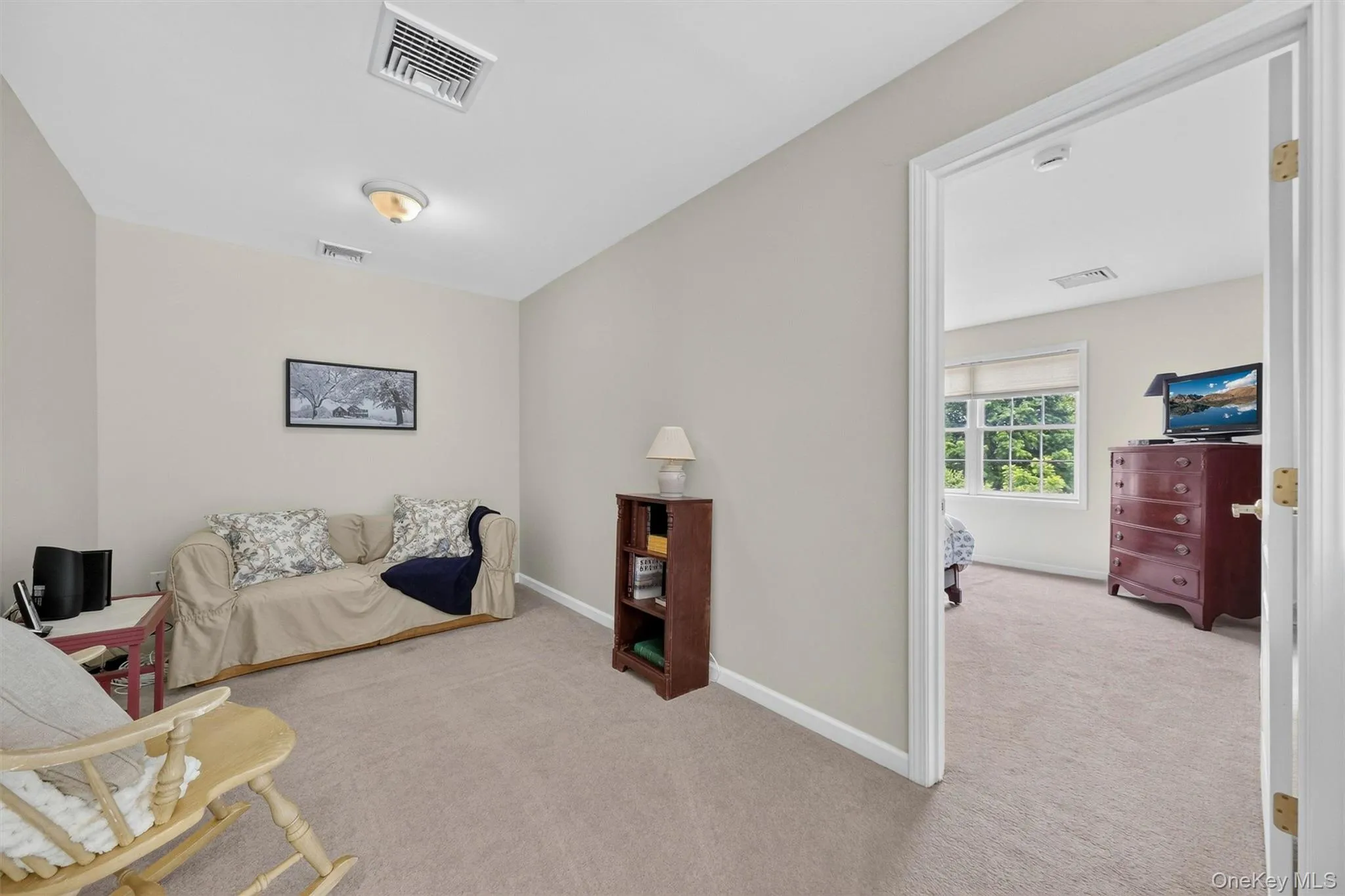 Loft area overlooks the family room with fireplace. Perfect for a reading nook or office space Loft area overlooks the family room with fireplace. Perfect for a reading nook or office space