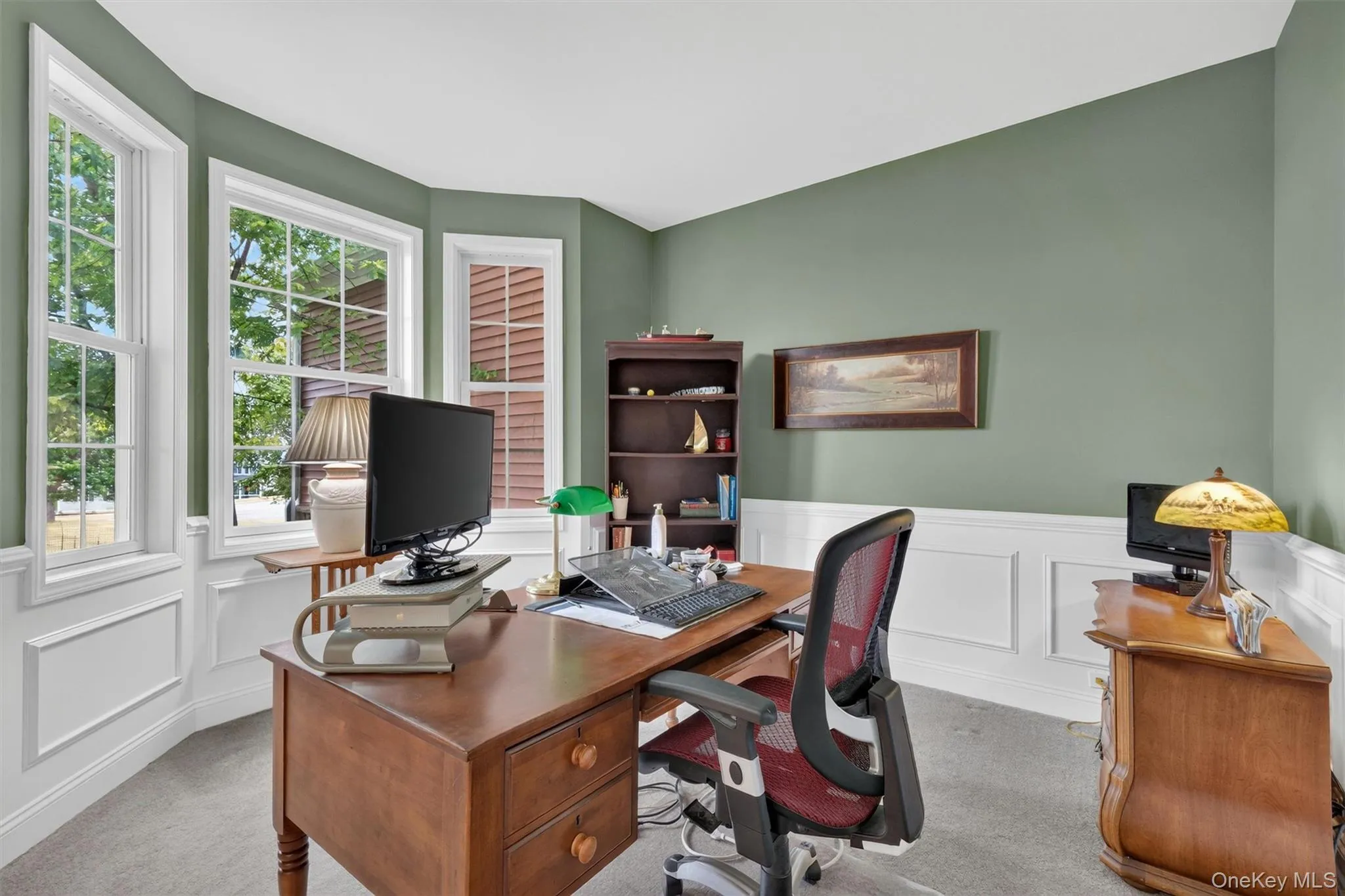 Front den or office with a bay window for extra natural light Front den or office with a bay window for extra natural light