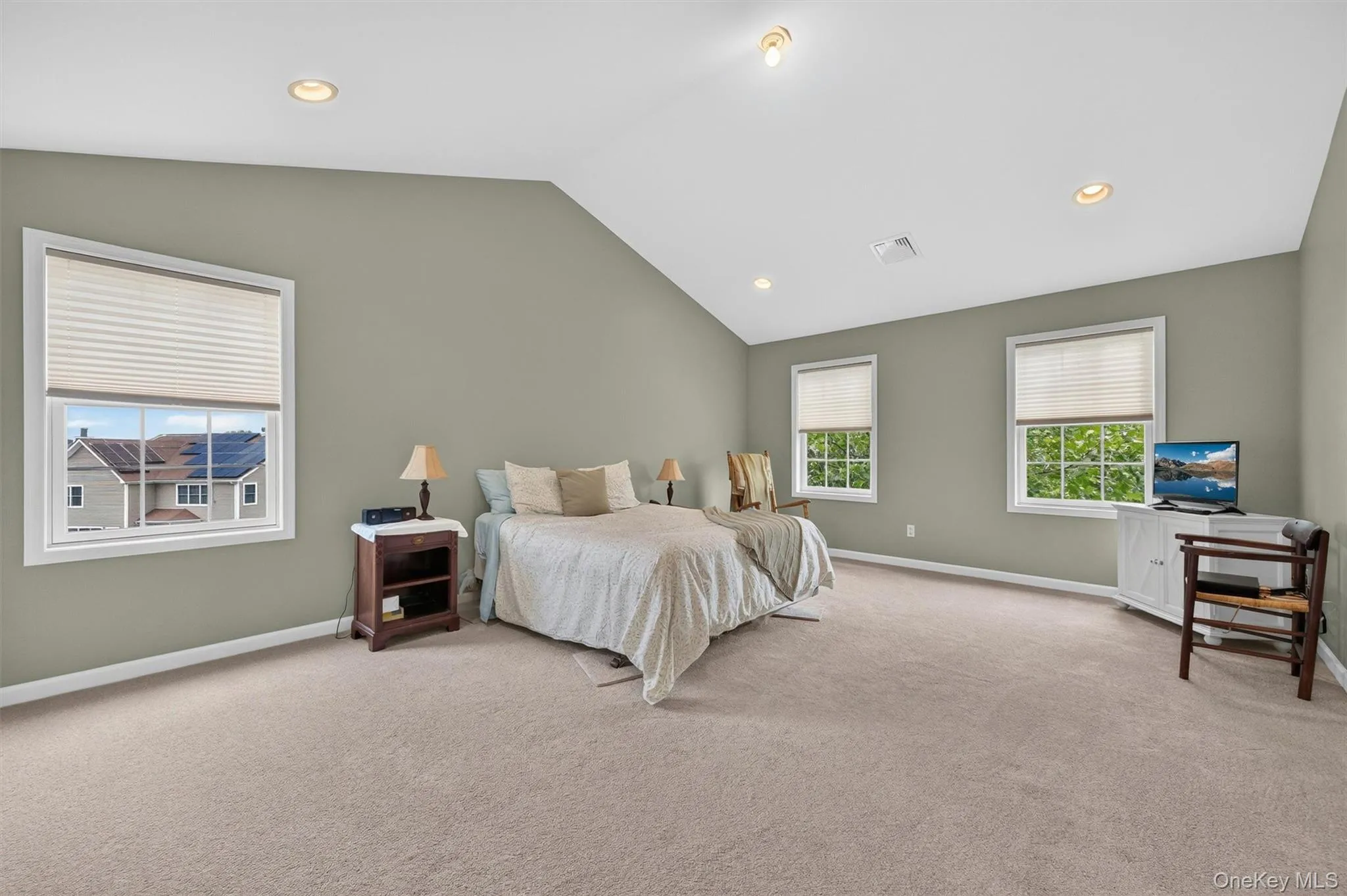 High ceilings in the primary with natural light High ceilings in the primary with natural light
