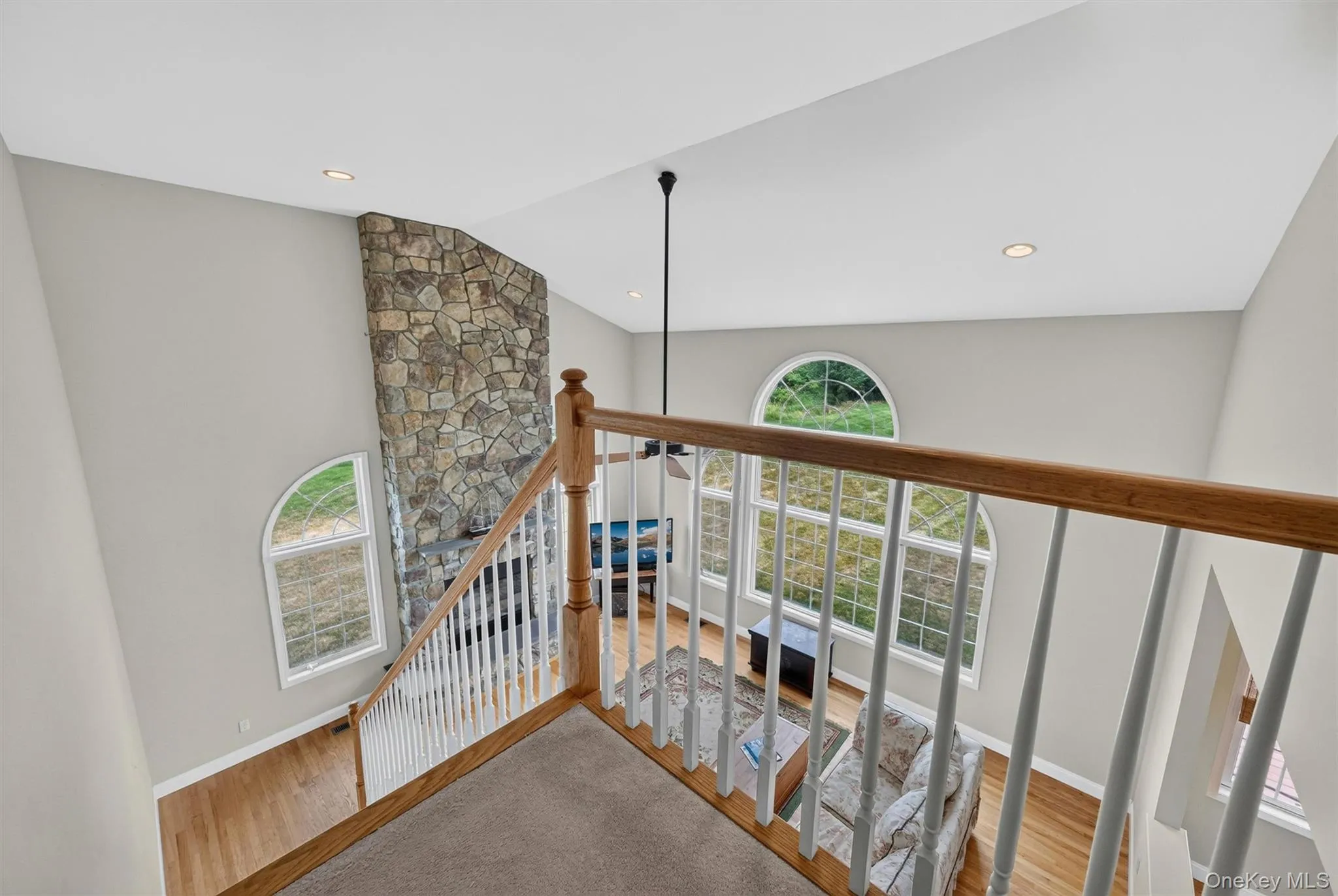 Back staircase offers great views of the main level Back staircase offers great views of the main level