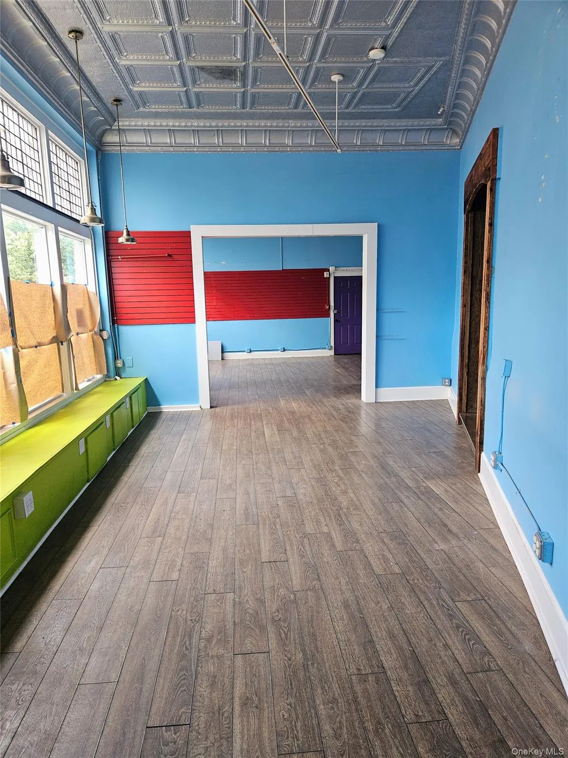 Approximately 250 sf front West Street room looking toward rear West Street space. Approximately 250 sf front West Street room looking toward rear West Street space.