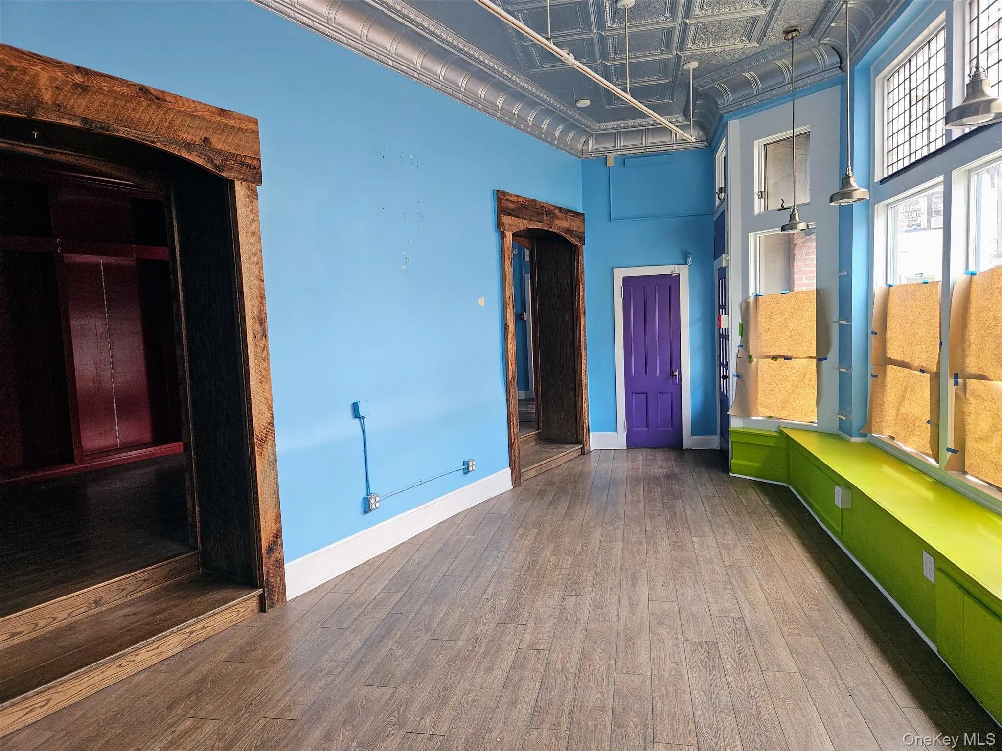 Front West Street space with two connections to the main showroom. Bathroom 2 is in the distance behind the closed door. Front West Street space with two connections to the main showroom. Bathroom 2 is in the distance behind the closed door.