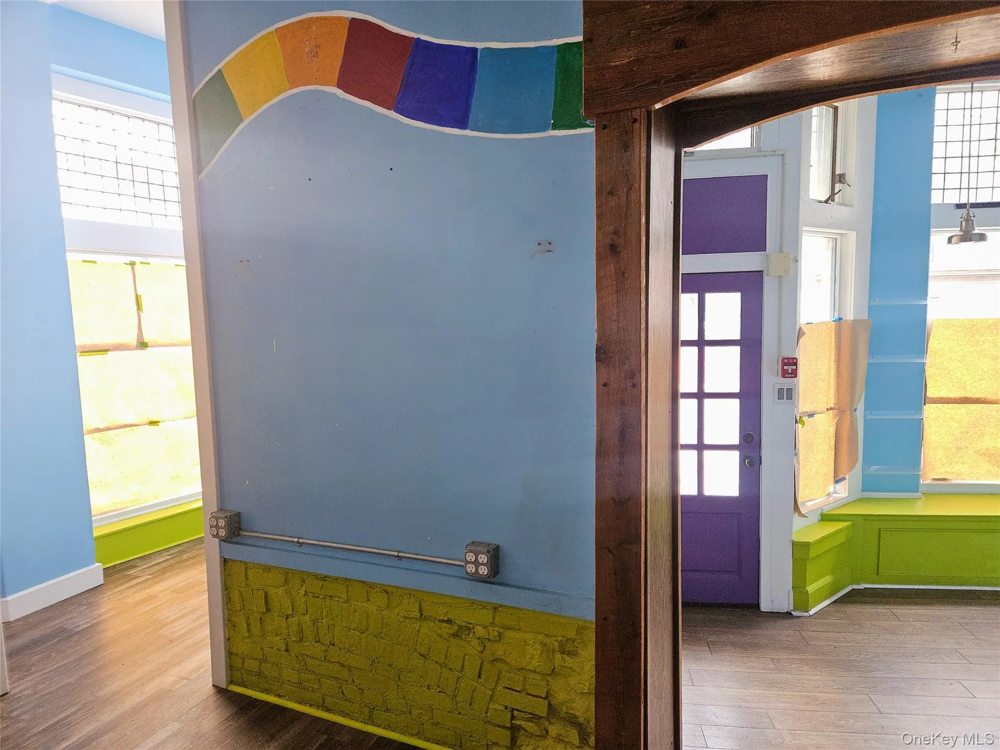 On left is the approximately 40 sf alcove at the building's corner at Main & West. On right is the first of two rooms on the West Street side of the space. On left is the approximately 40 sf alcove at the building's corner at Main & West. On right is the first of two rooms on the West Street side of the space.
