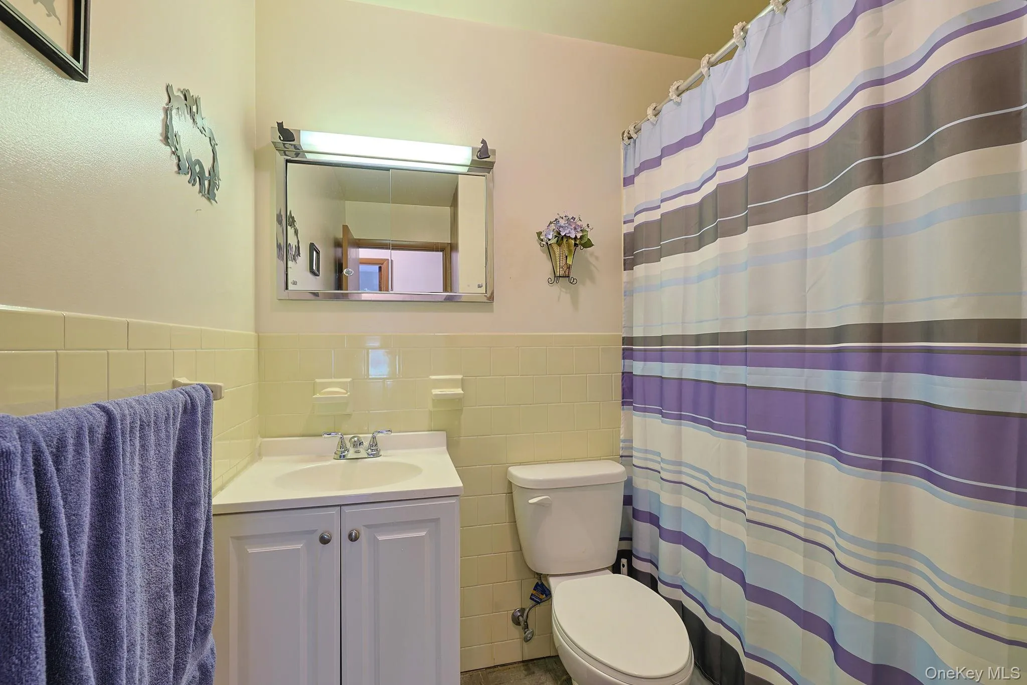 In the hallway outside the bedroom, you'll find a full bathroom. In the hallway outside the bedroom, you'll find a full bathroom.