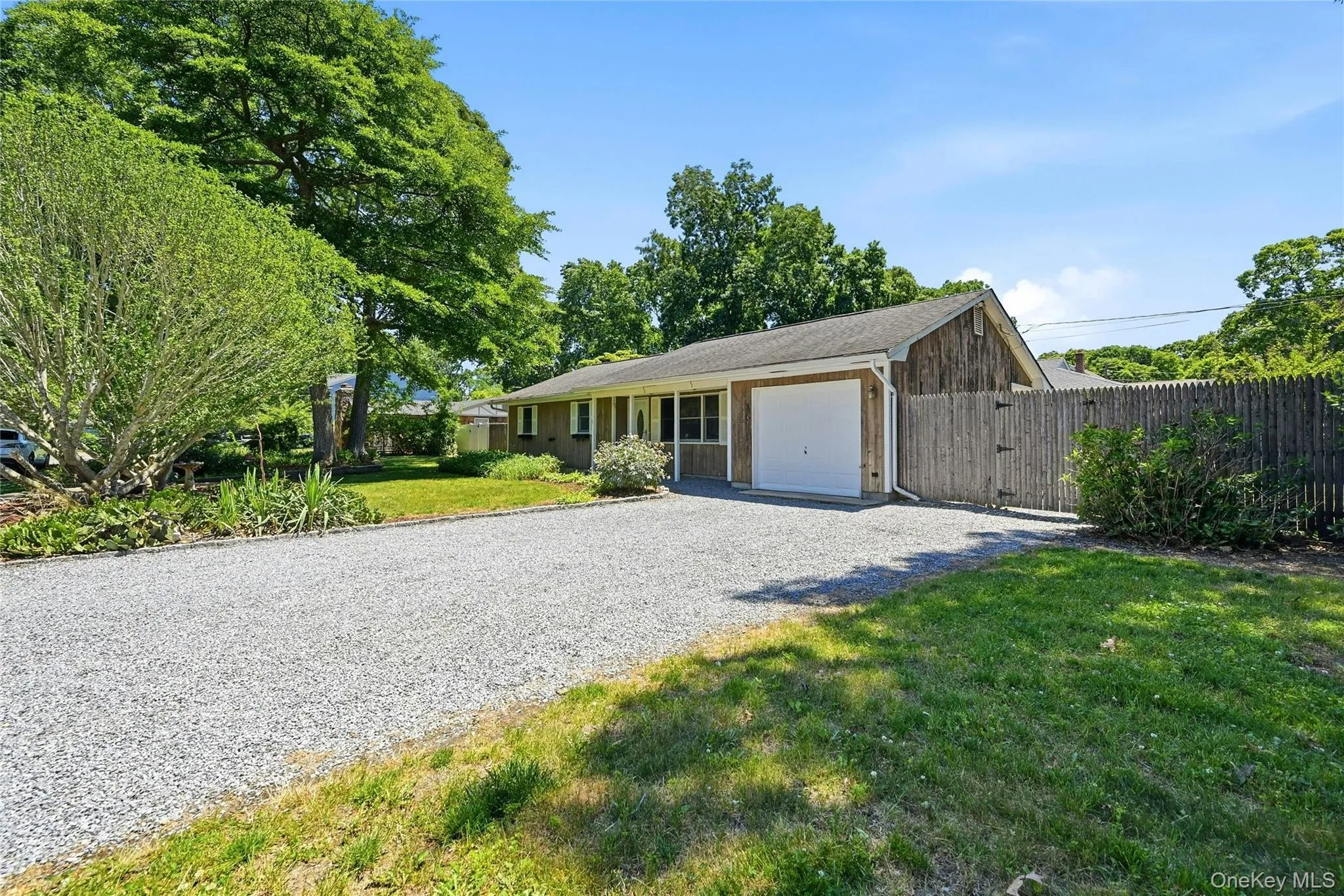 Attached one car garage, in addition to a pull down attic stairs making it convenient for extra storage space. Attached one car garage, in addition to a pull down attic stairs making it convenient for extra storage space.