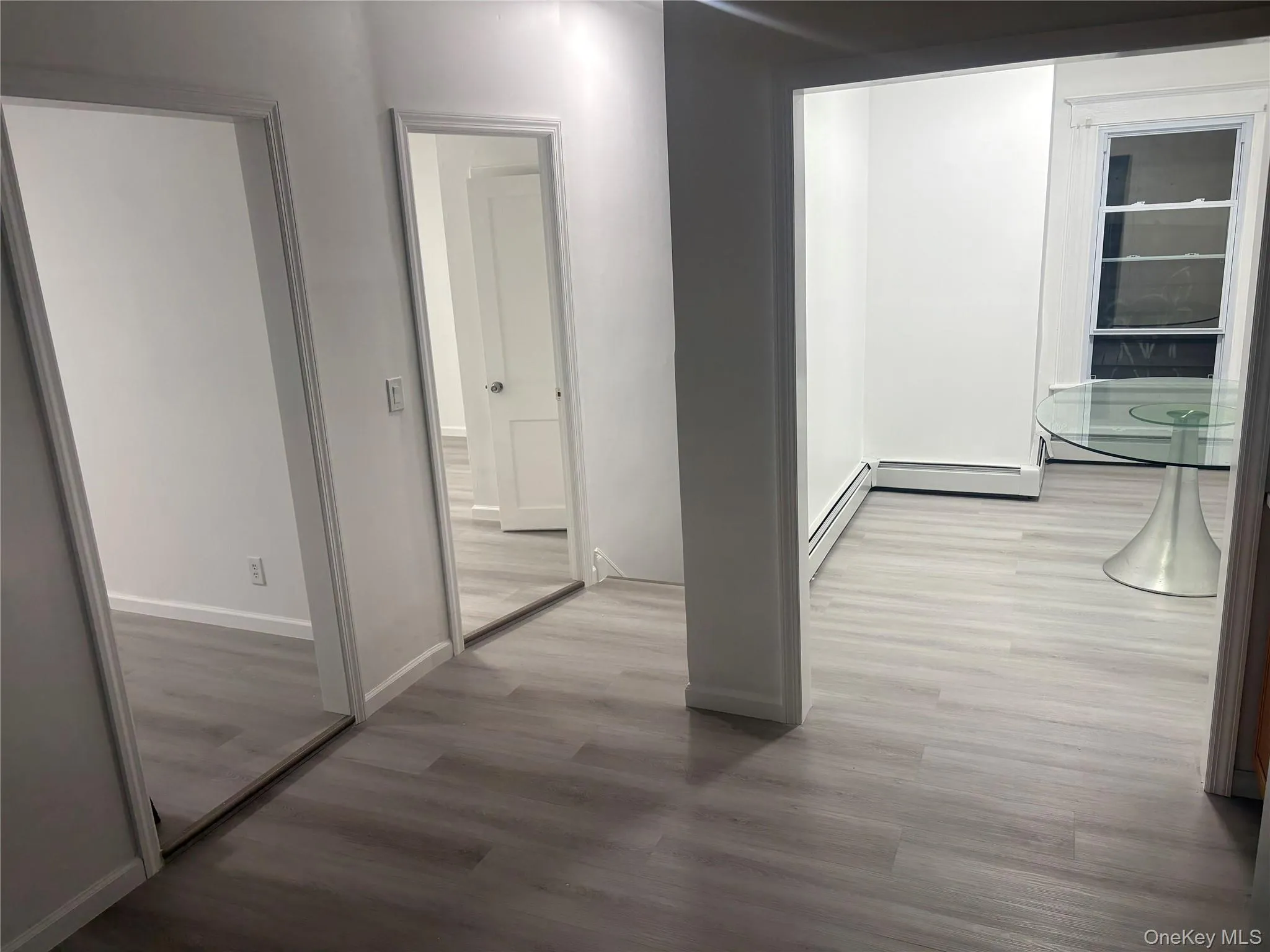 Welcoming entry area featuring new flooring, fresh paint, and access to the main living spaces. Welcoming entry area featuring new flooring, fresh paint, and access to the main living spaces.