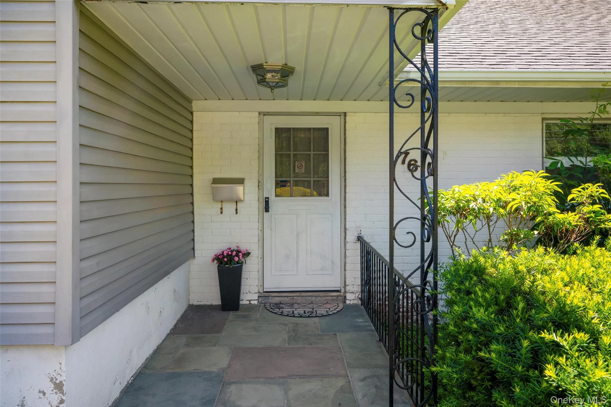 Large Covered Entry Way protects you and your packages from inclement weather. Large Covered Entry Way protects you and your packages from inclement weather.