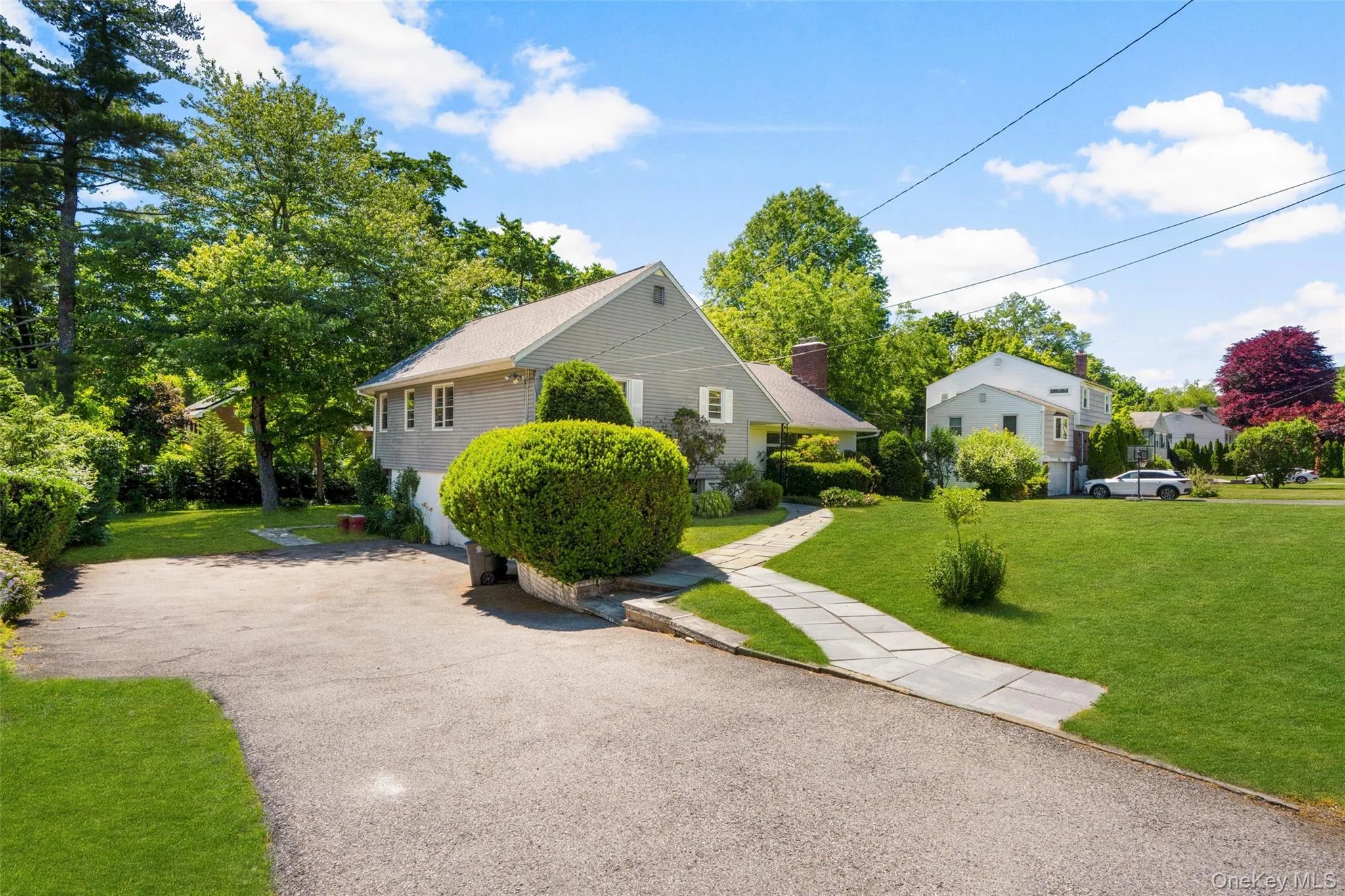 Wide Driveway which can accommodate up to 6 cars leads to 2-Car Garage not seen from street. Wide Driveway which can accommodate up to 6 cars leads to 2-Car Garage not seen from street.