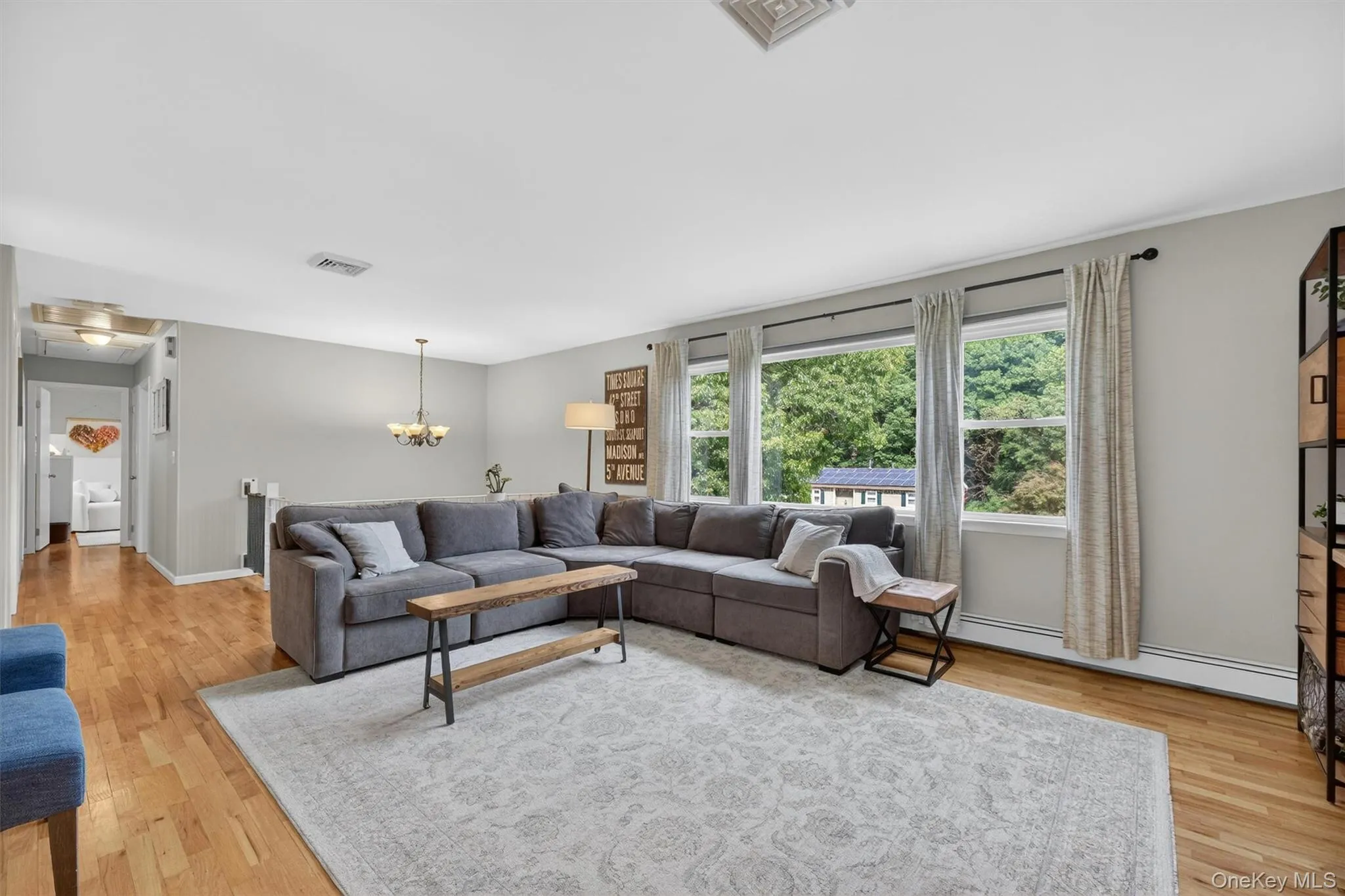 The spacious living room is the perfect spot for entertaining. The spacious living room is the perfect spot for entertaining.