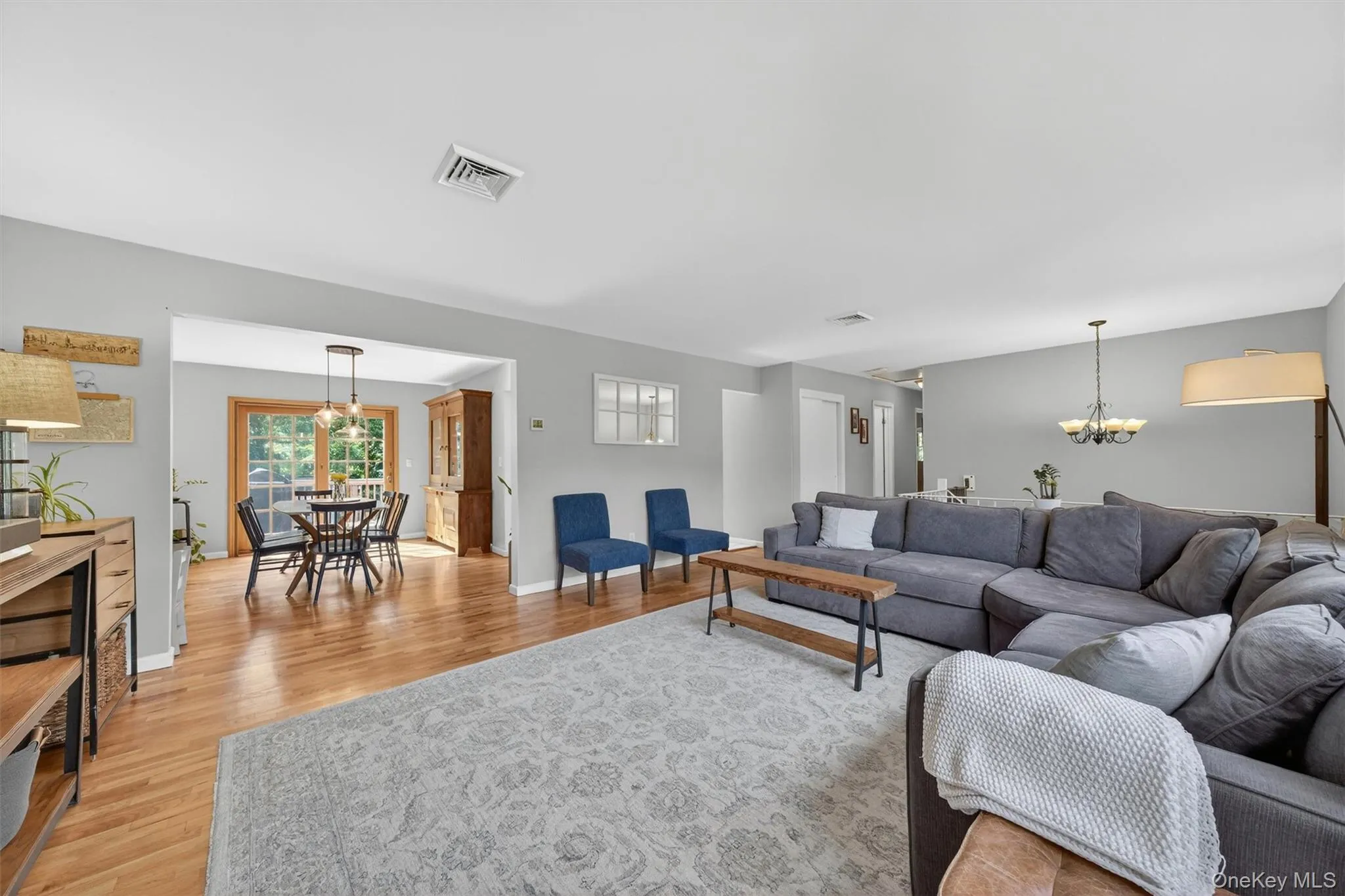 The living room opens to the formal dining room. The living room opens to the formal dining room.