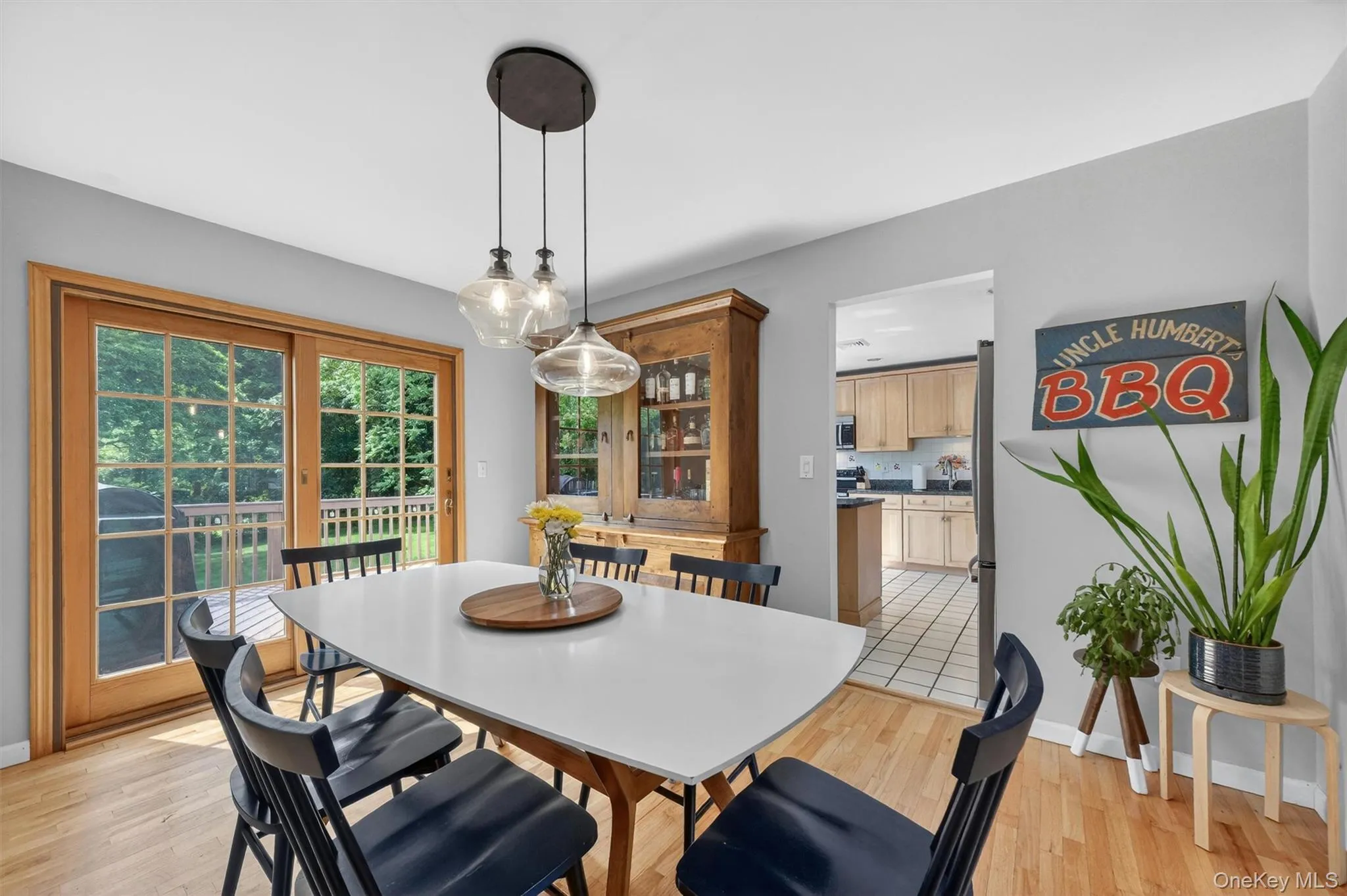 Large dining room. Sliding glass door from living room takes you out to the oversized deck, overlooking the patio and private yard. Large dining room. Sliding glass door from living room takes you out to the oversized deck, overlooking the patio and private yard.